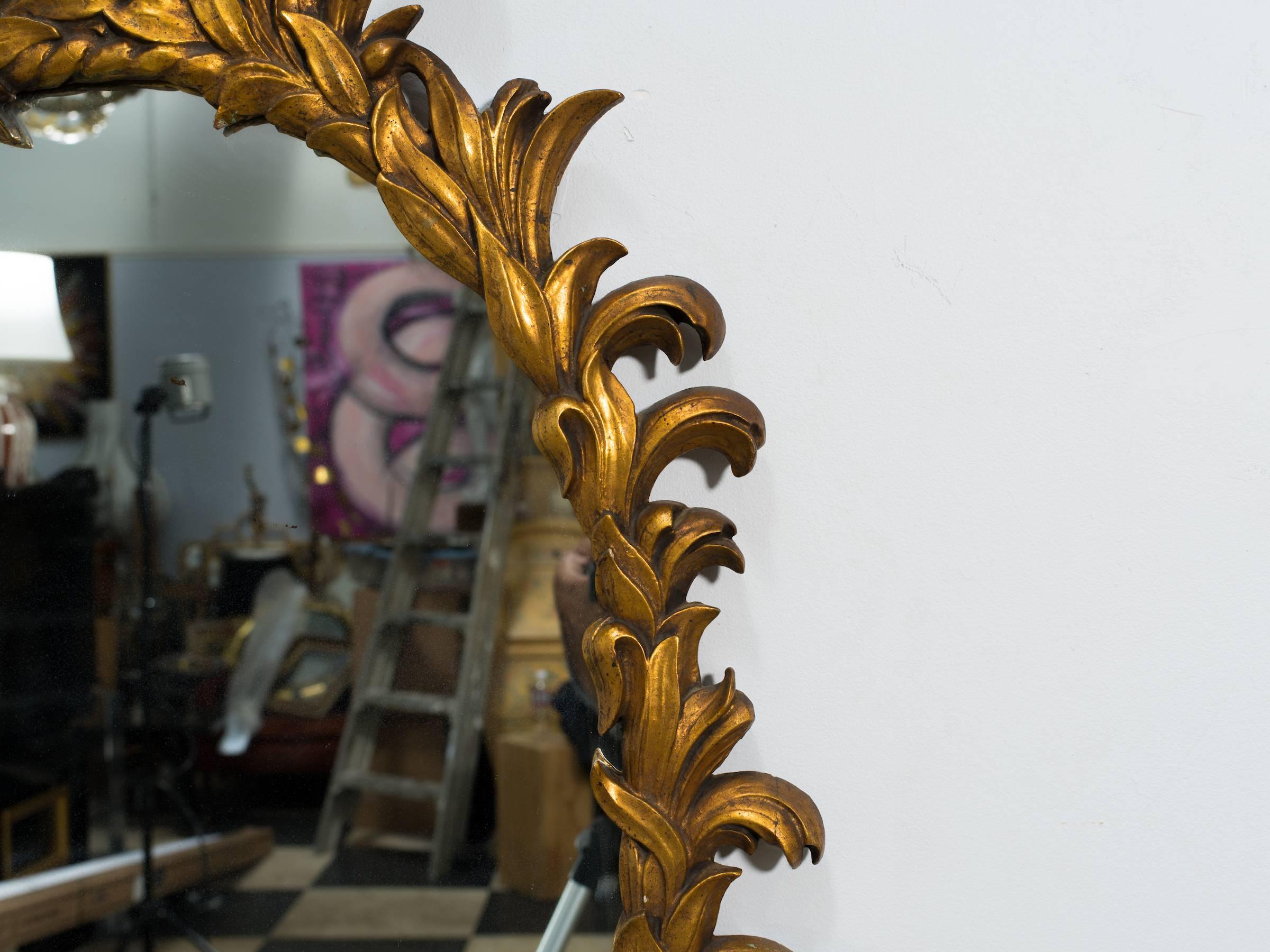 1960s Carved Giltwood Italian Oval Mirror 1