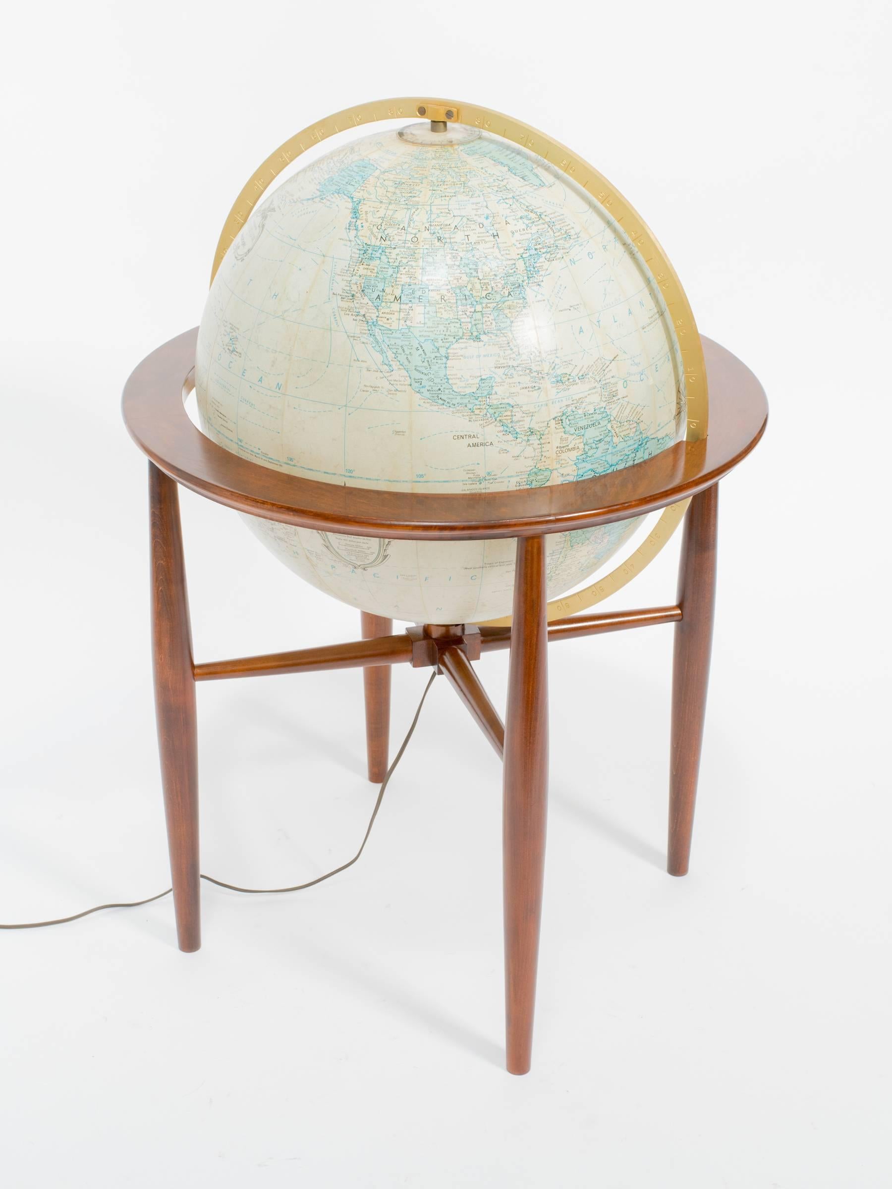 Refinished Replogle illuminated globe on stand.