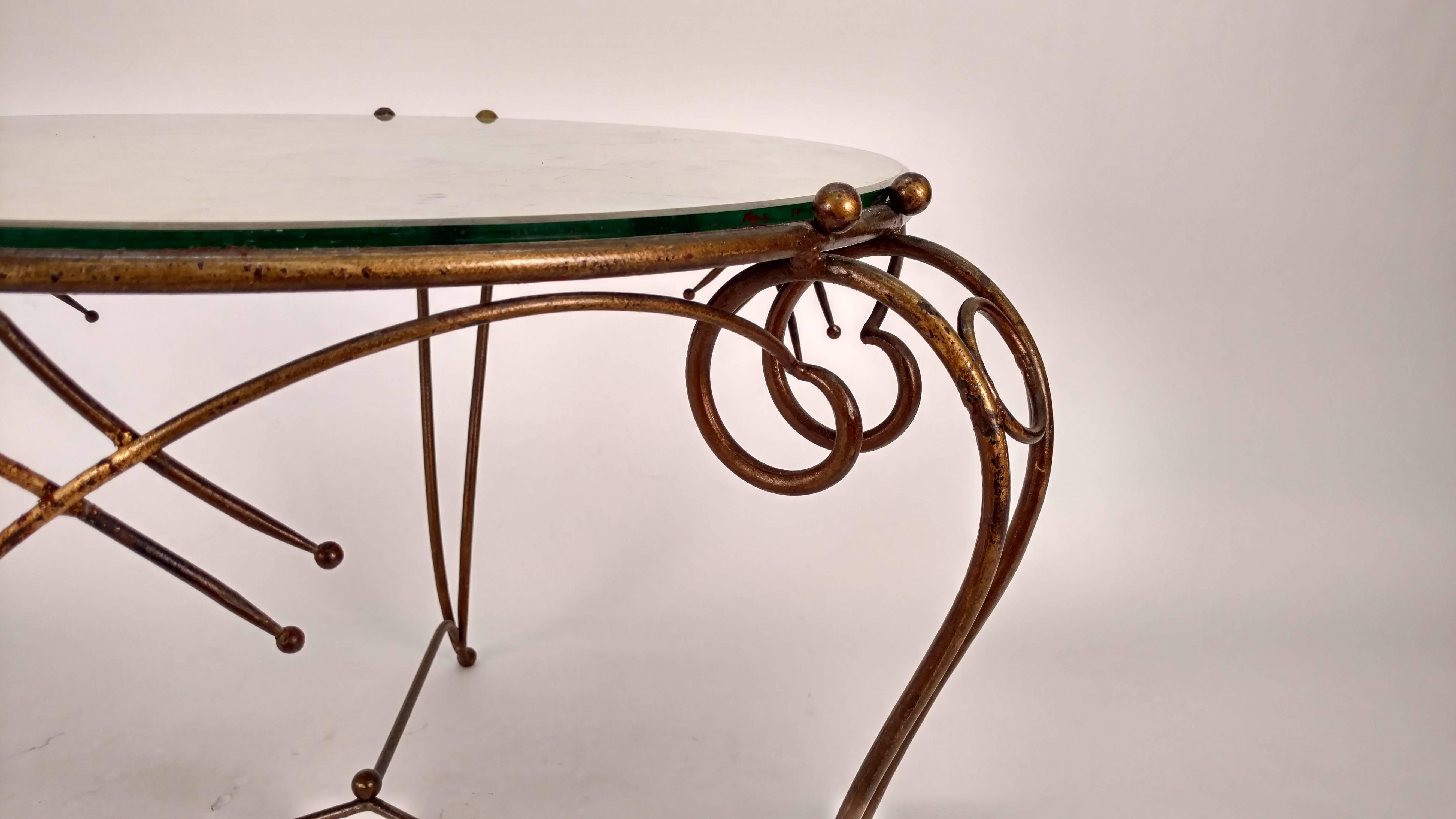 Gilt metal table in the manner of Jean-Charles Moreux.
Great craftsmanship.