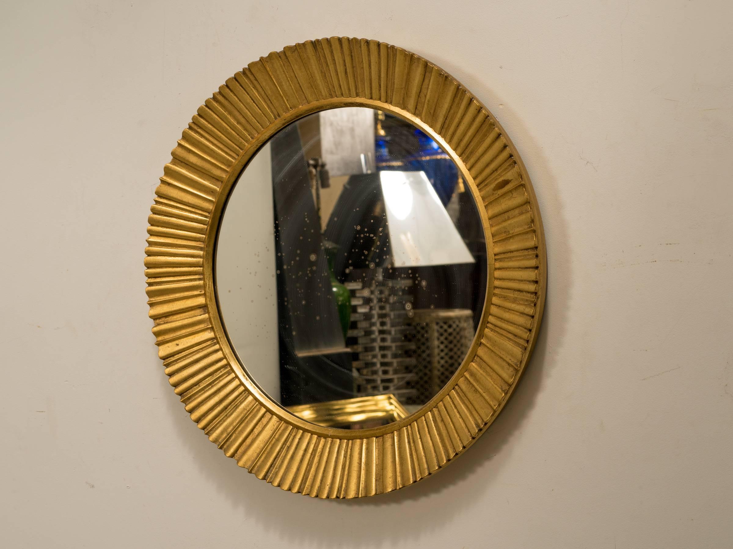 1950s solid wood gilt starburst mirror.