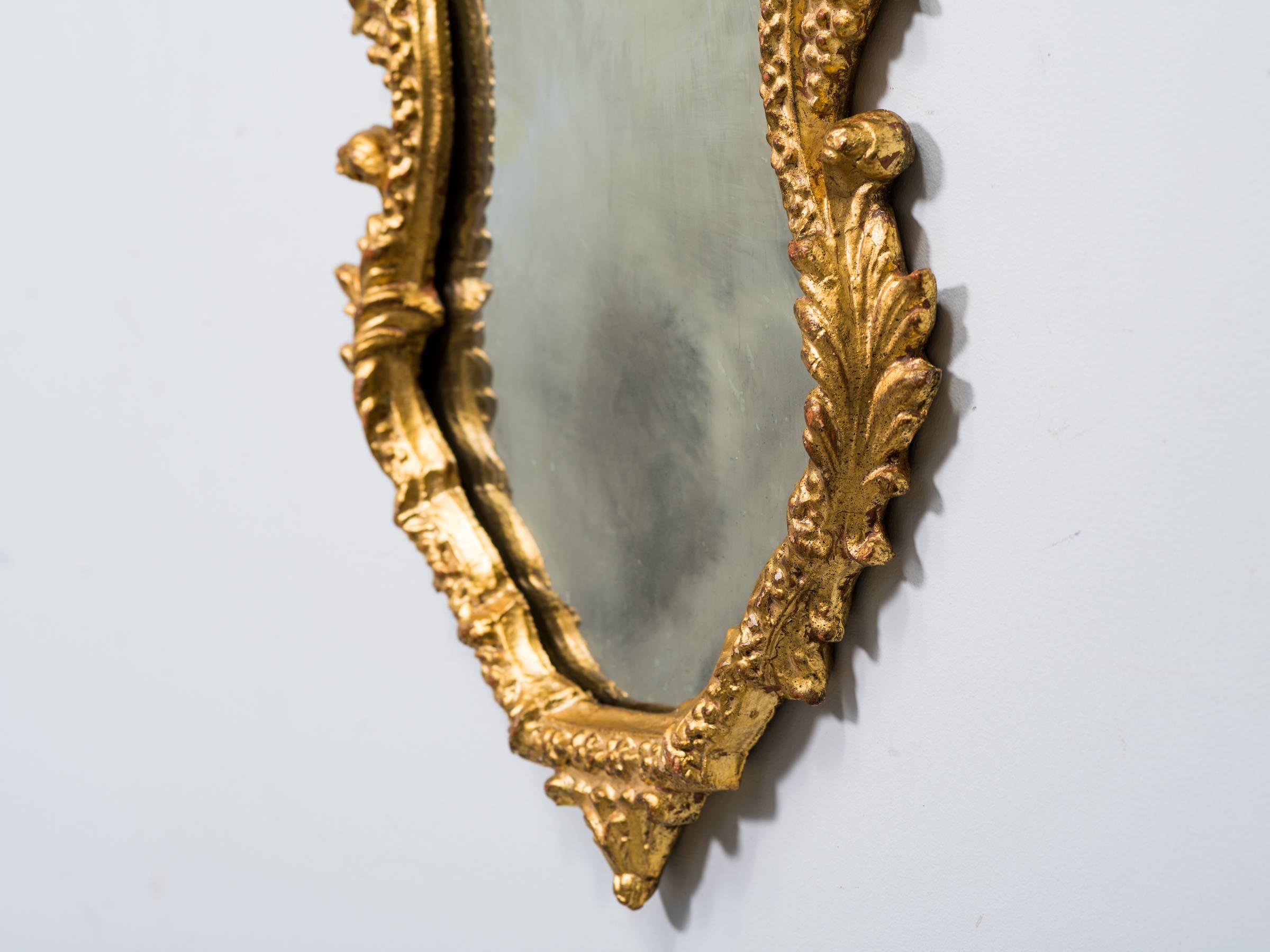 Pair of 1940s Italian Carved Gilt Wood Mirrors with Antiqued Glass In Good Condition In Tarrytown, NY