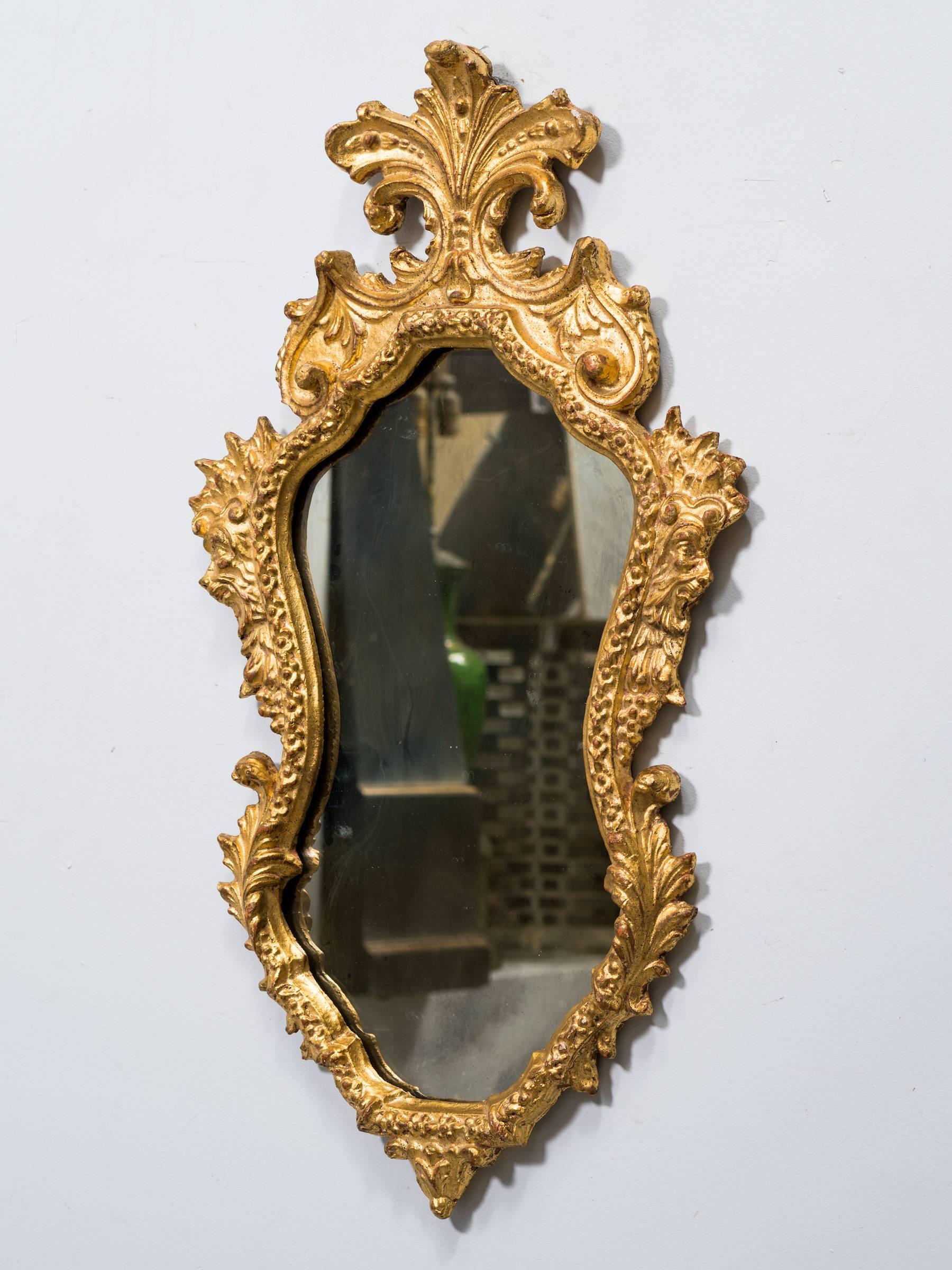 Mid-20th Century Pair of 1940s Italian Carved Gilt Wood Mirrors with Antiqued Glass