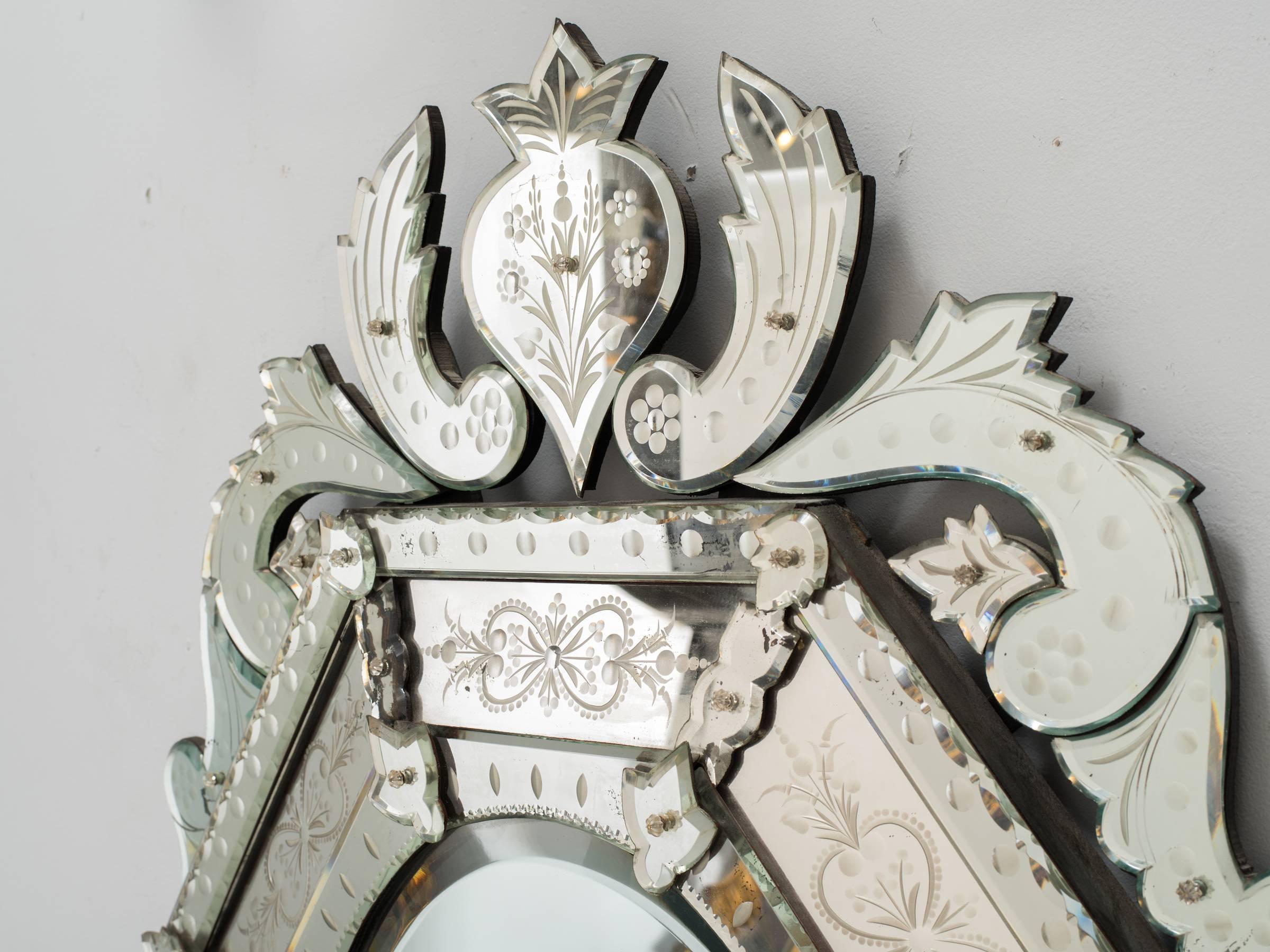  1930s octagonal Venetian mirror with crown.