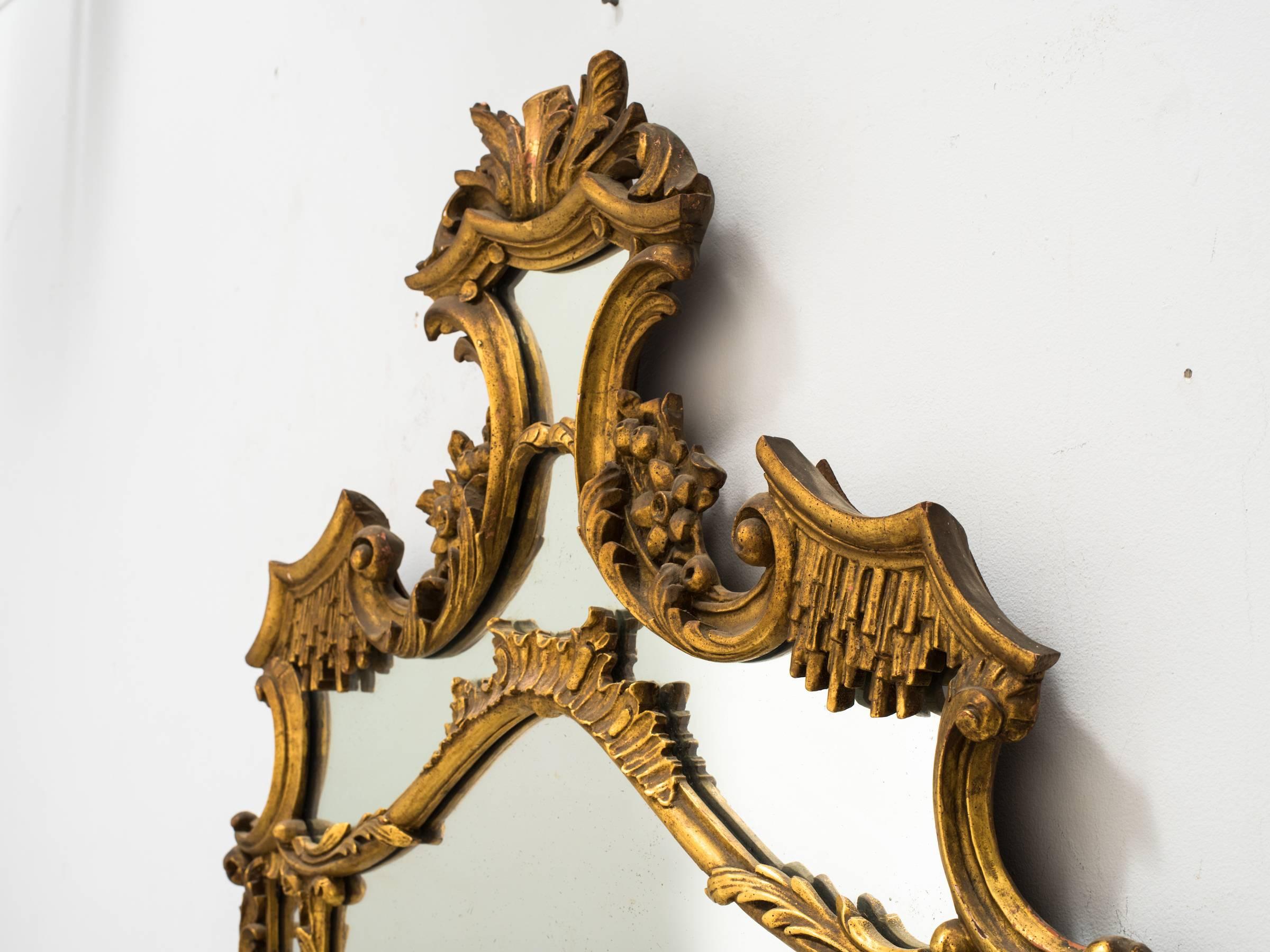 1930s carved gilt wood French mirror.