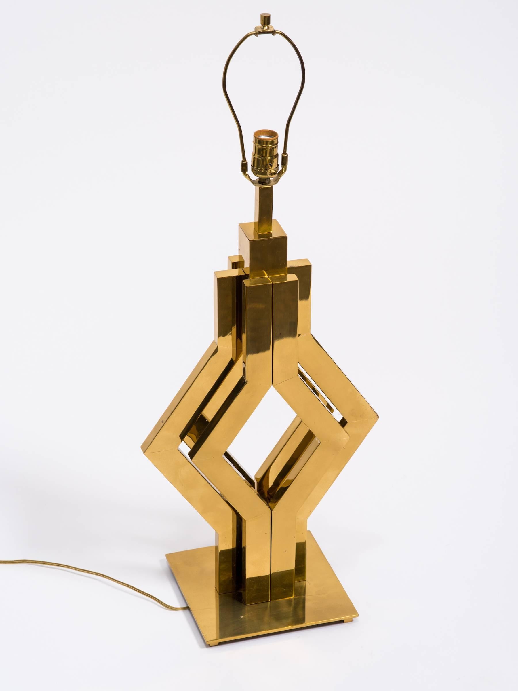 1970s geometric brass table lamp, spots on finish.

Height is to top of socket.