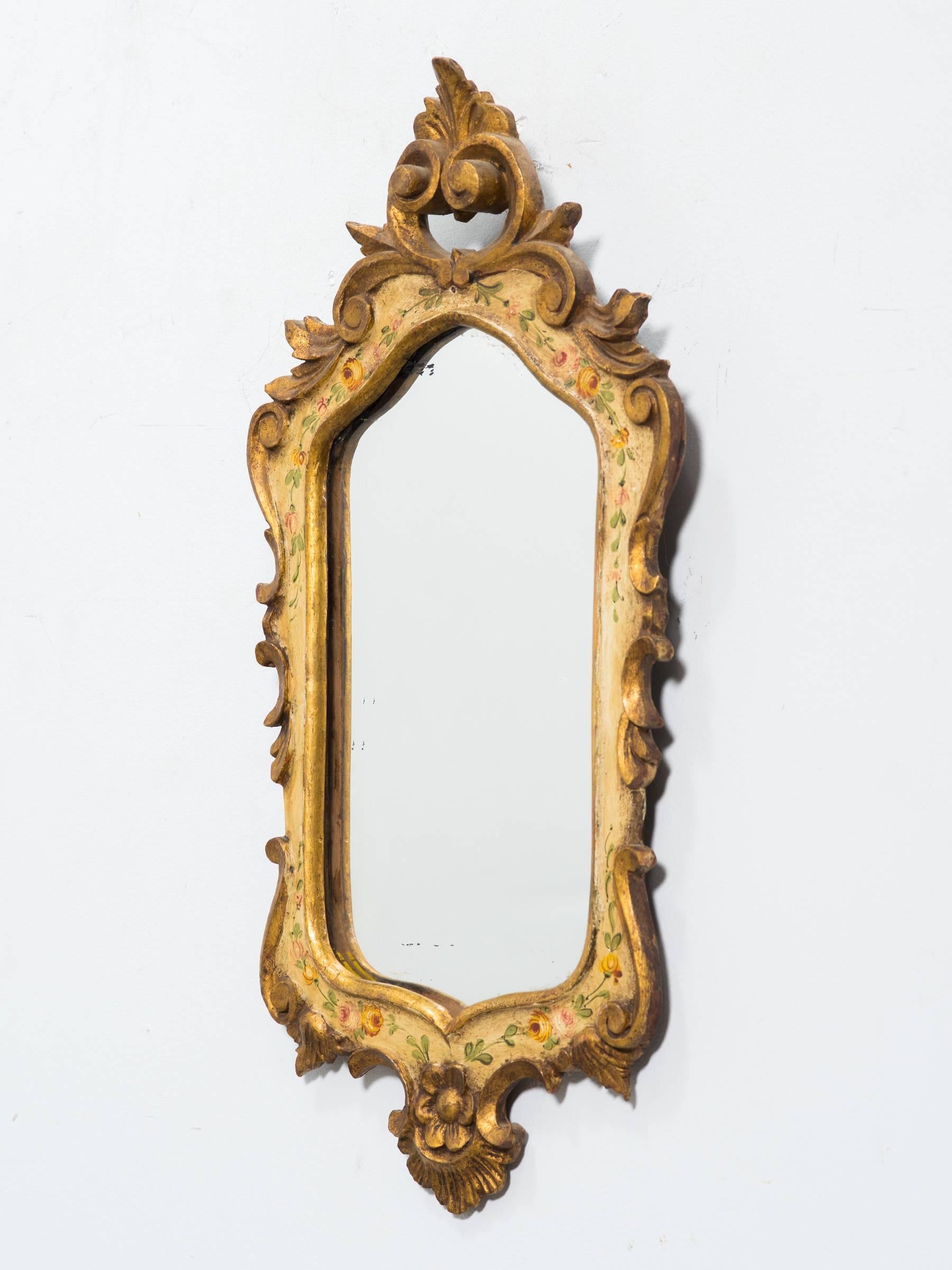 Pair of hand-painted / giltwood Italian mirrors from the 1950s.