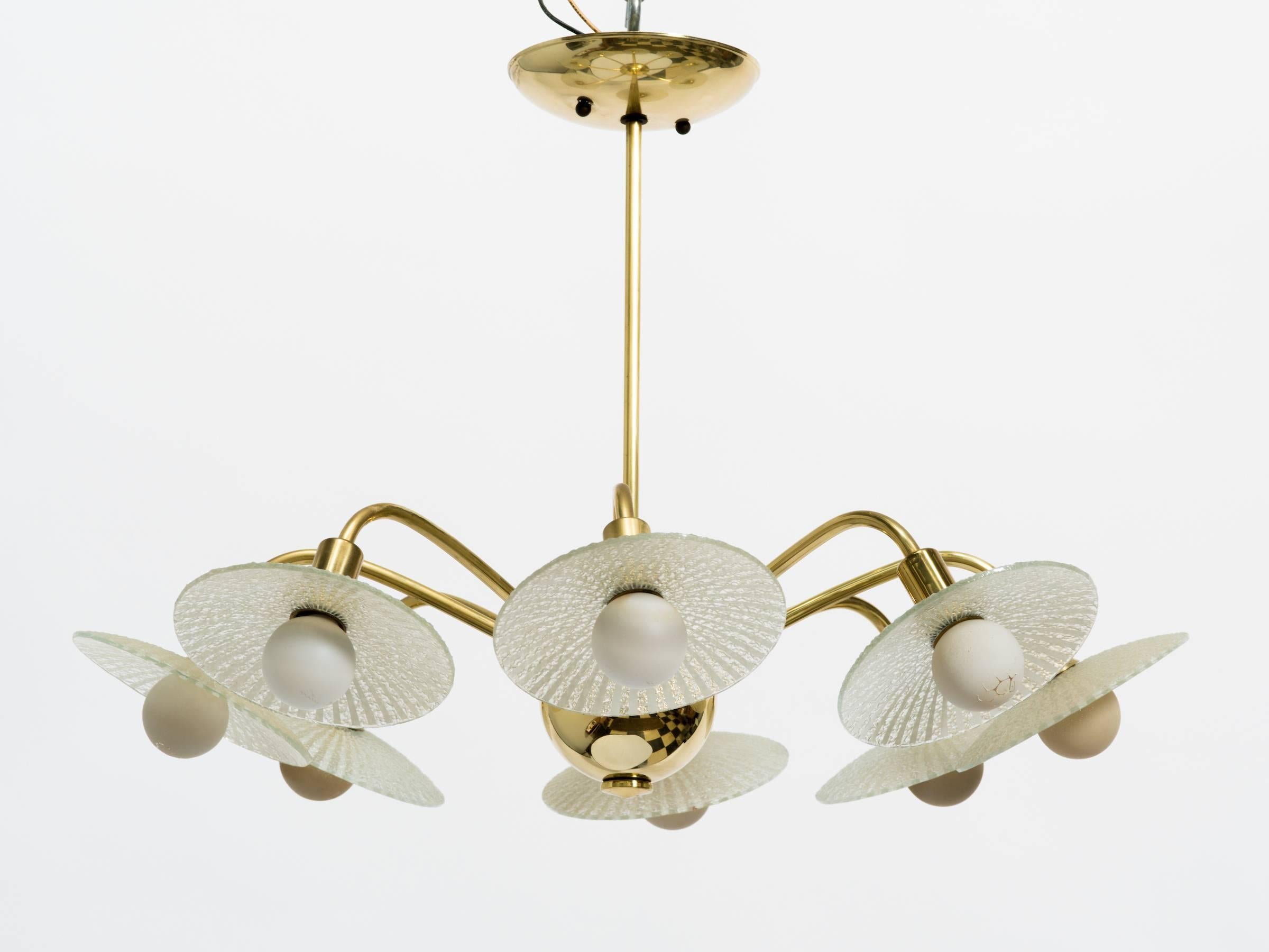 Stilnovo brass chandelier with glass bobeches.