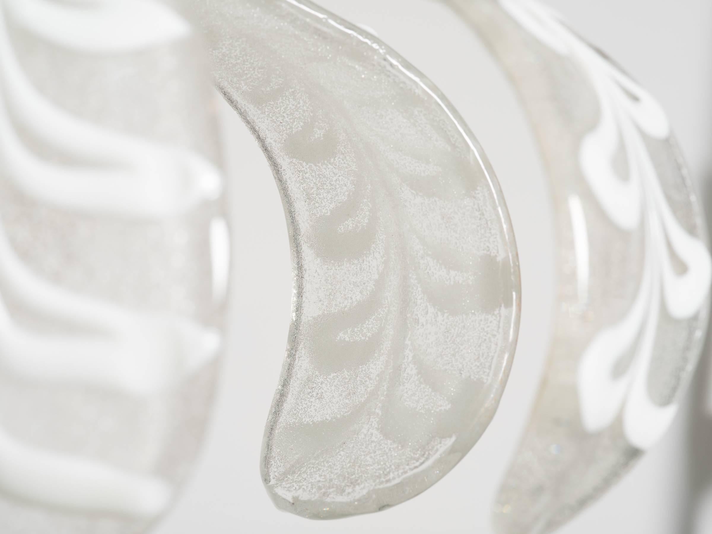 Murano leaf chandelier.

This chandelier was never used, was still in original box when I purchased it.