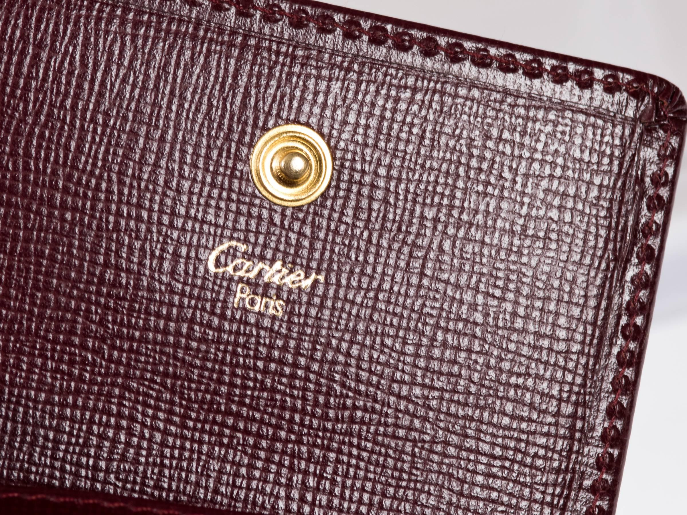 Parure de stylos et crayons Cartier avec porte-monnaie en cuir 1