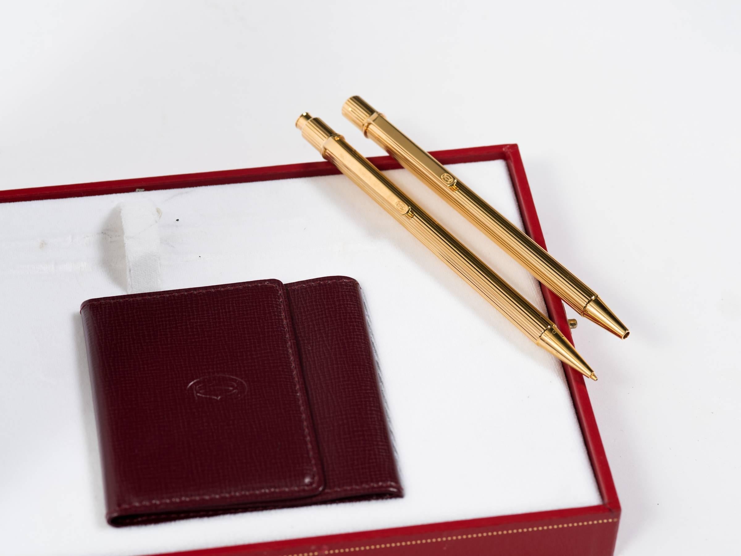 Parure de stylos et crayons Cartier avec porte-monnaie en cuir 3
