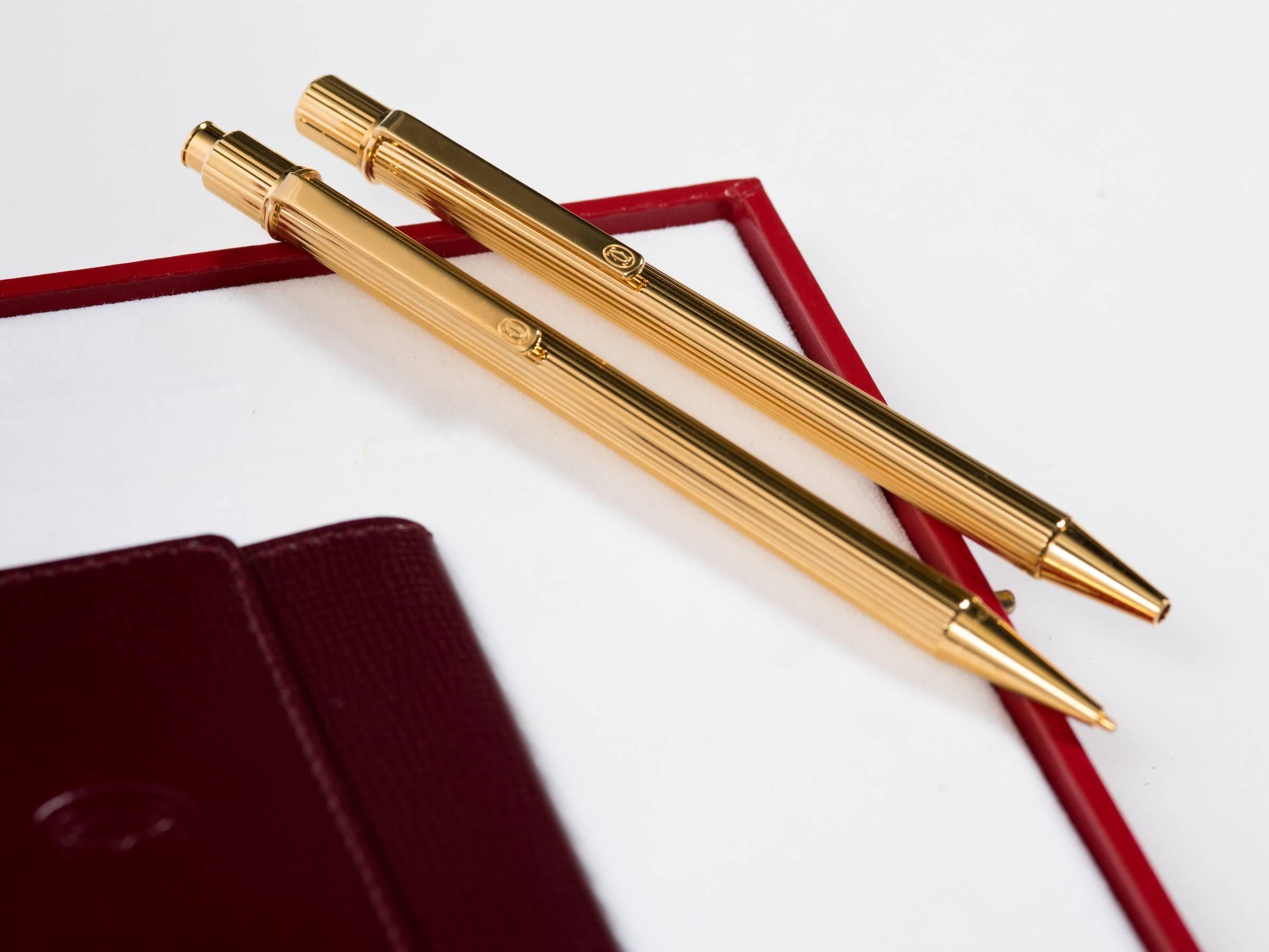 Parure de stylos et crayons Cartier avec porte-monnaie en cuir 4