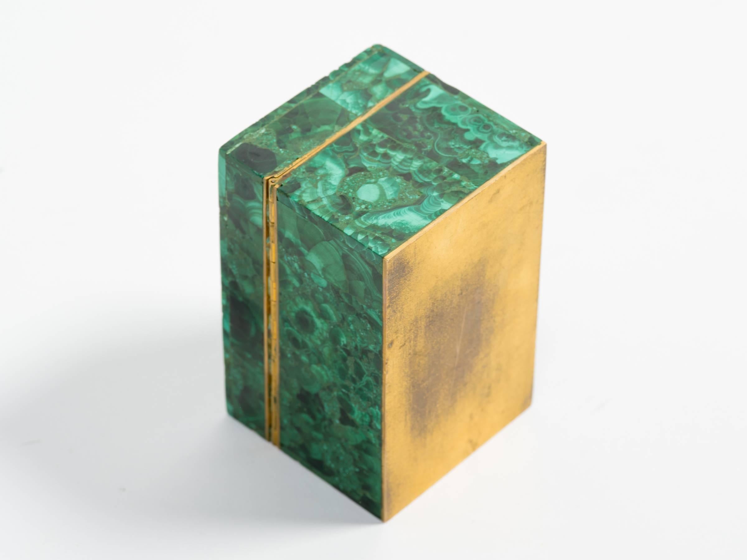 Malachite box with brass trim and brass bottom.
