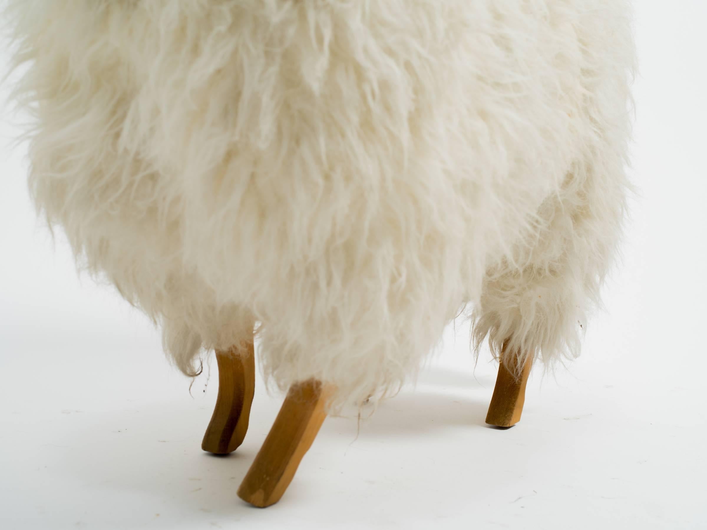 Life-size sheep made from sheep fur and wood. Very Yve Saint Laurent.