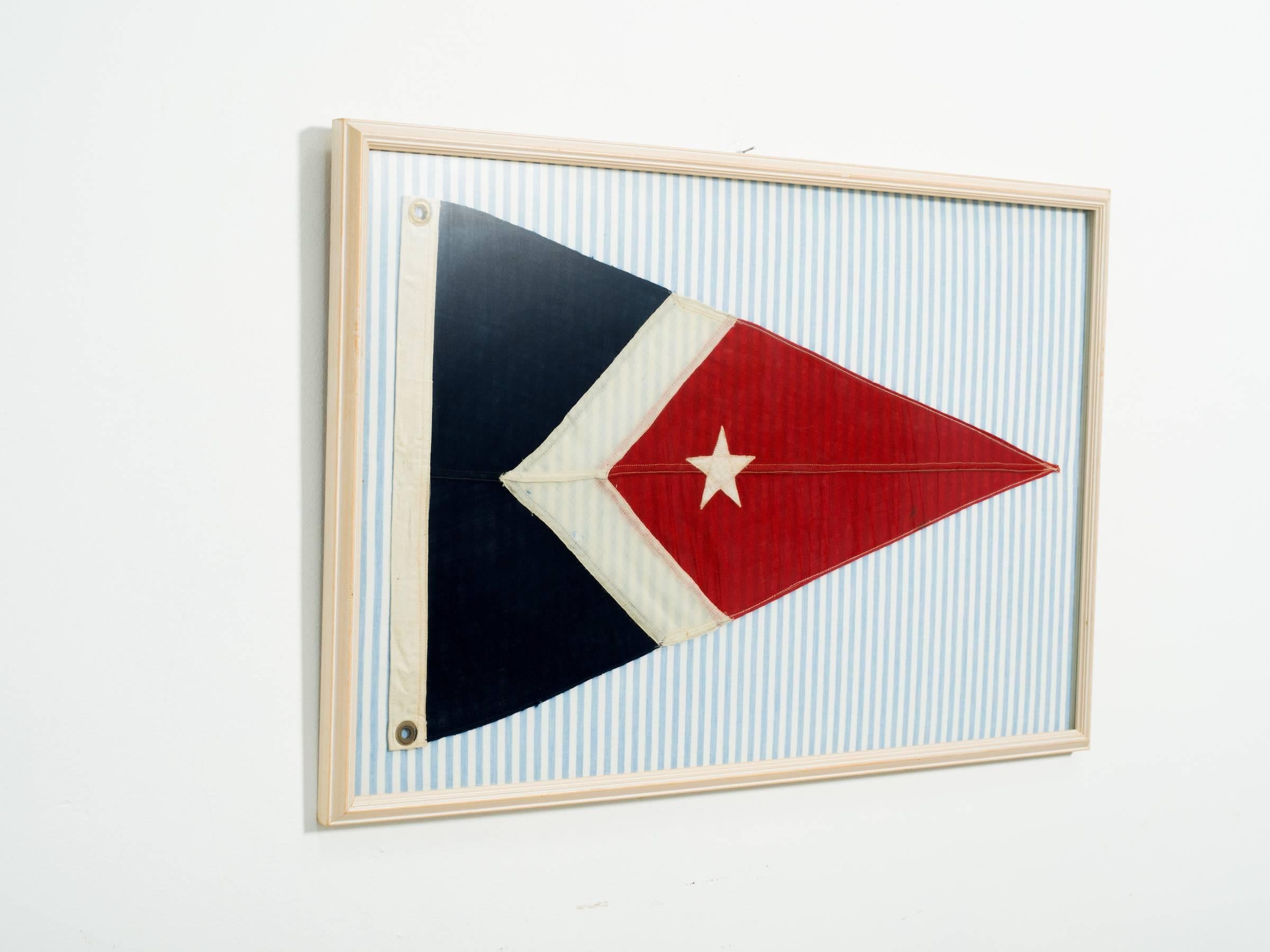 Pair of framed nautical flags from the Greenwich, Connecticut Yacht club.