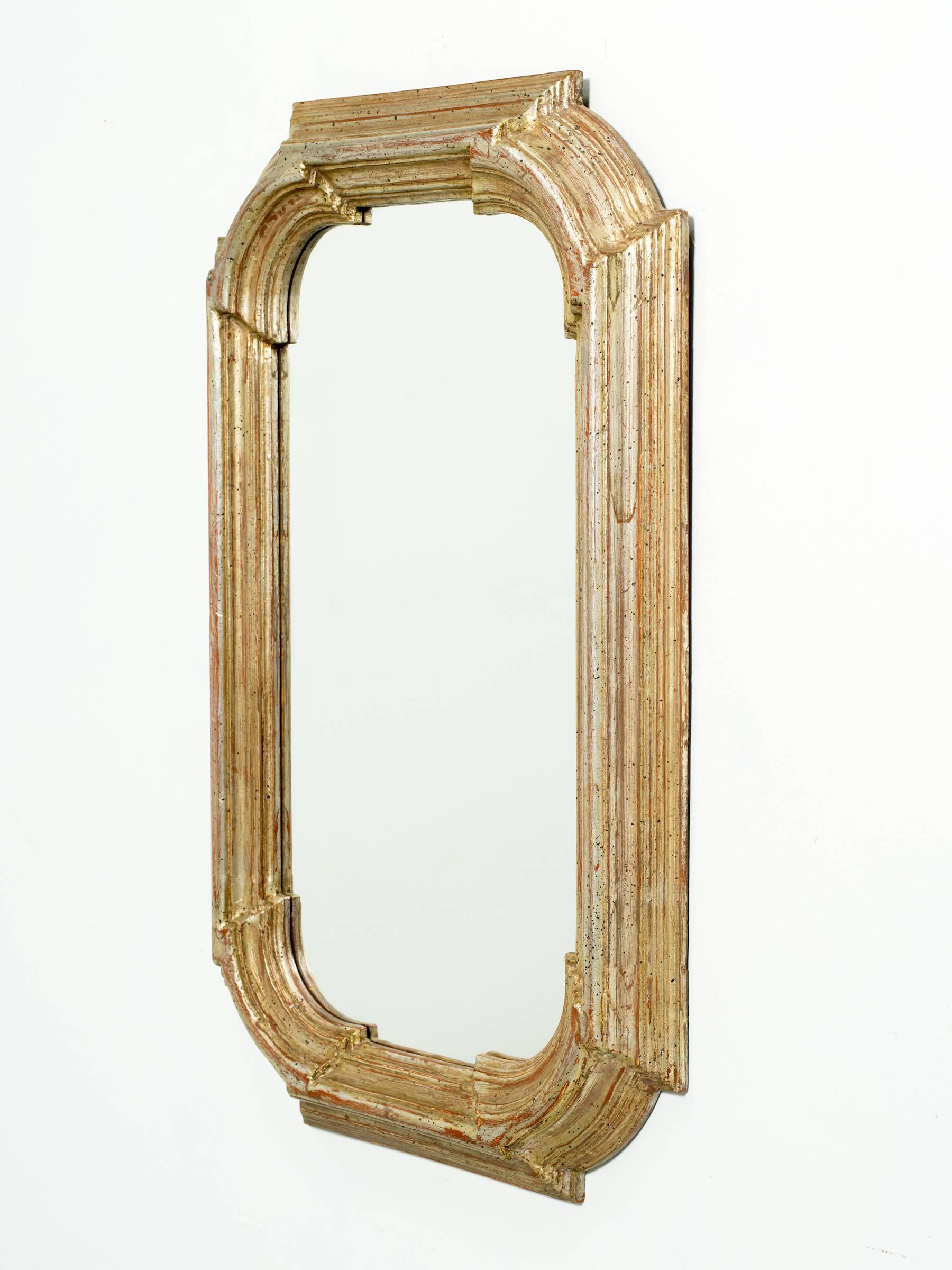 Italian thick framed wood mirror in silver leaf finish.