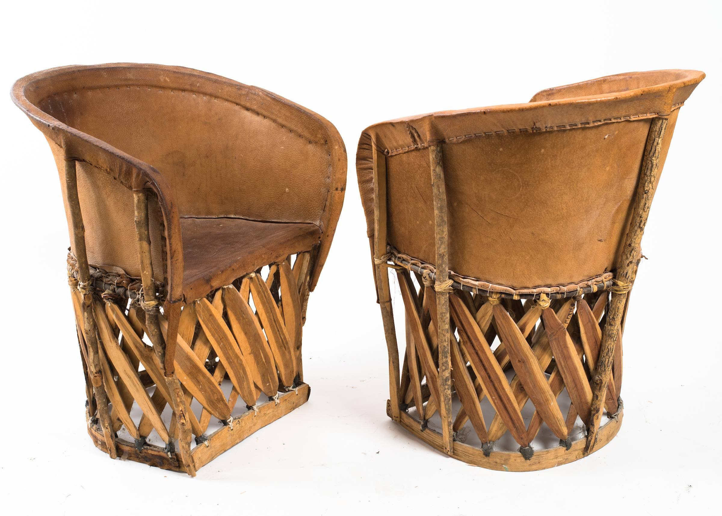 Four Leather Safari Chairs 2