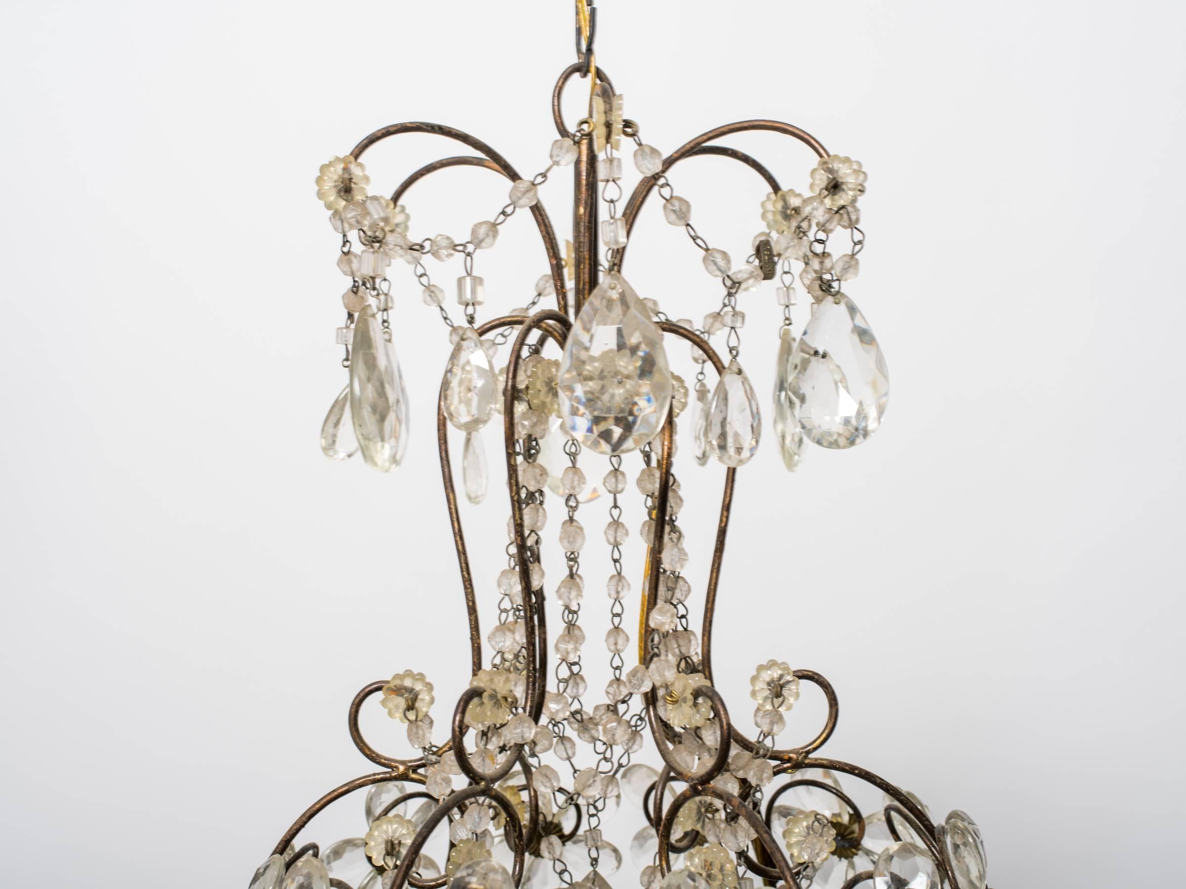 Pair of 1960s Italian crystal floral chandeliers tagged Italy.