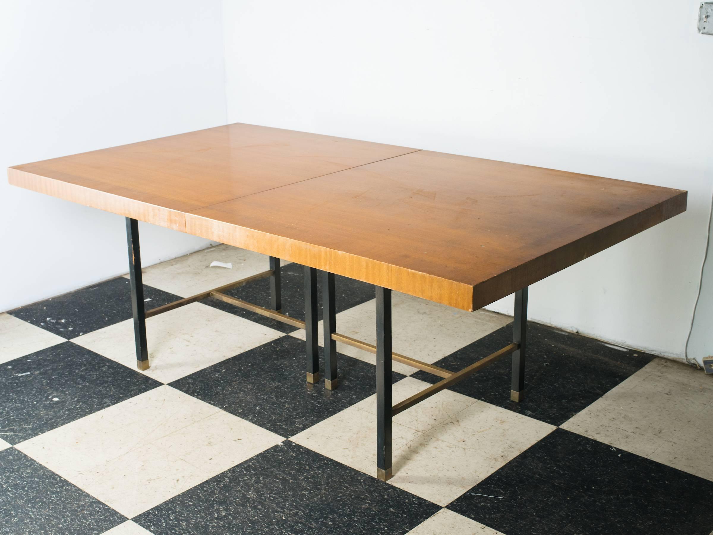 Harvey Probber dining table with two leaves.
 