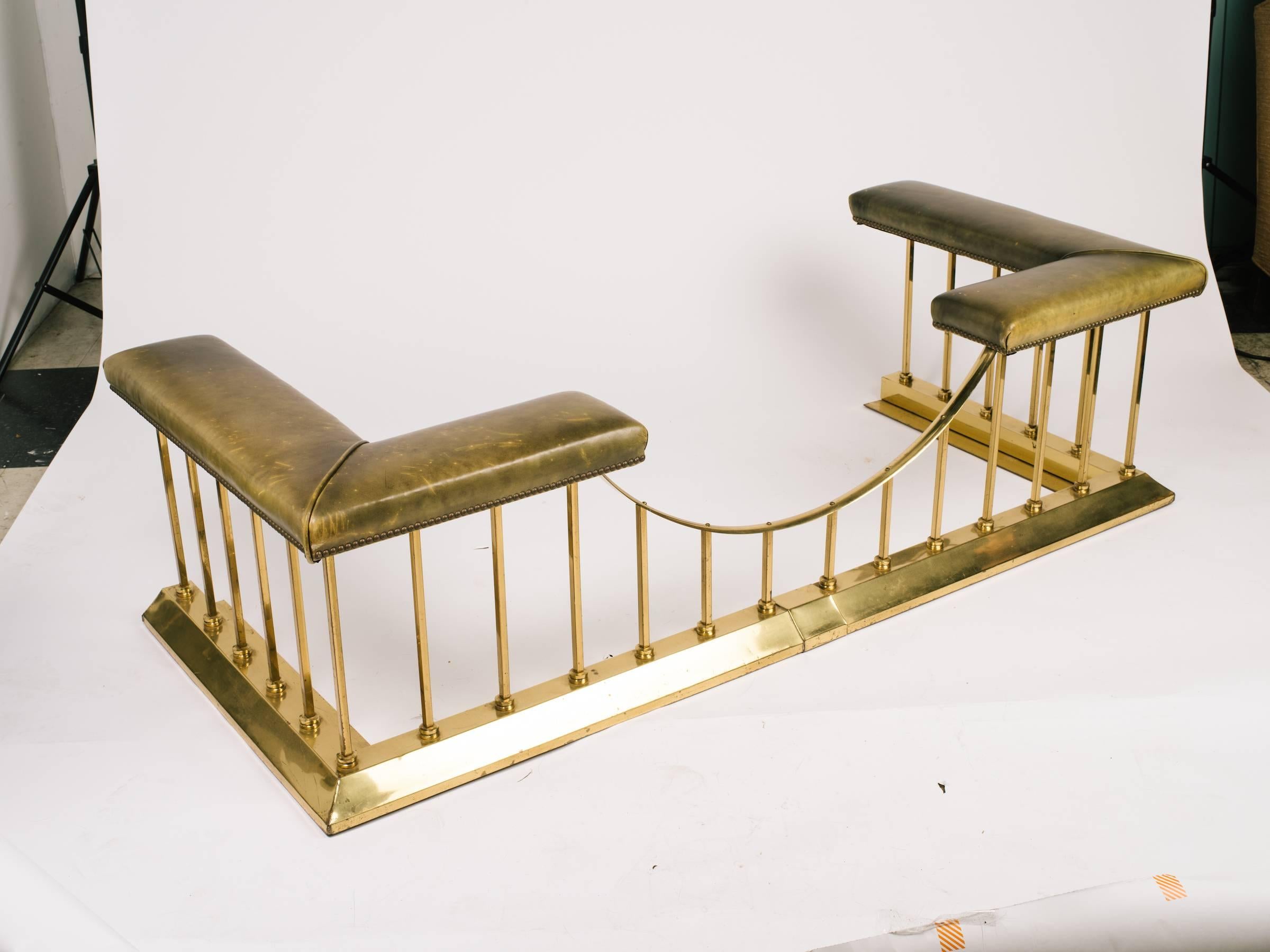 1880s English brass and leather fire place fender bench. 