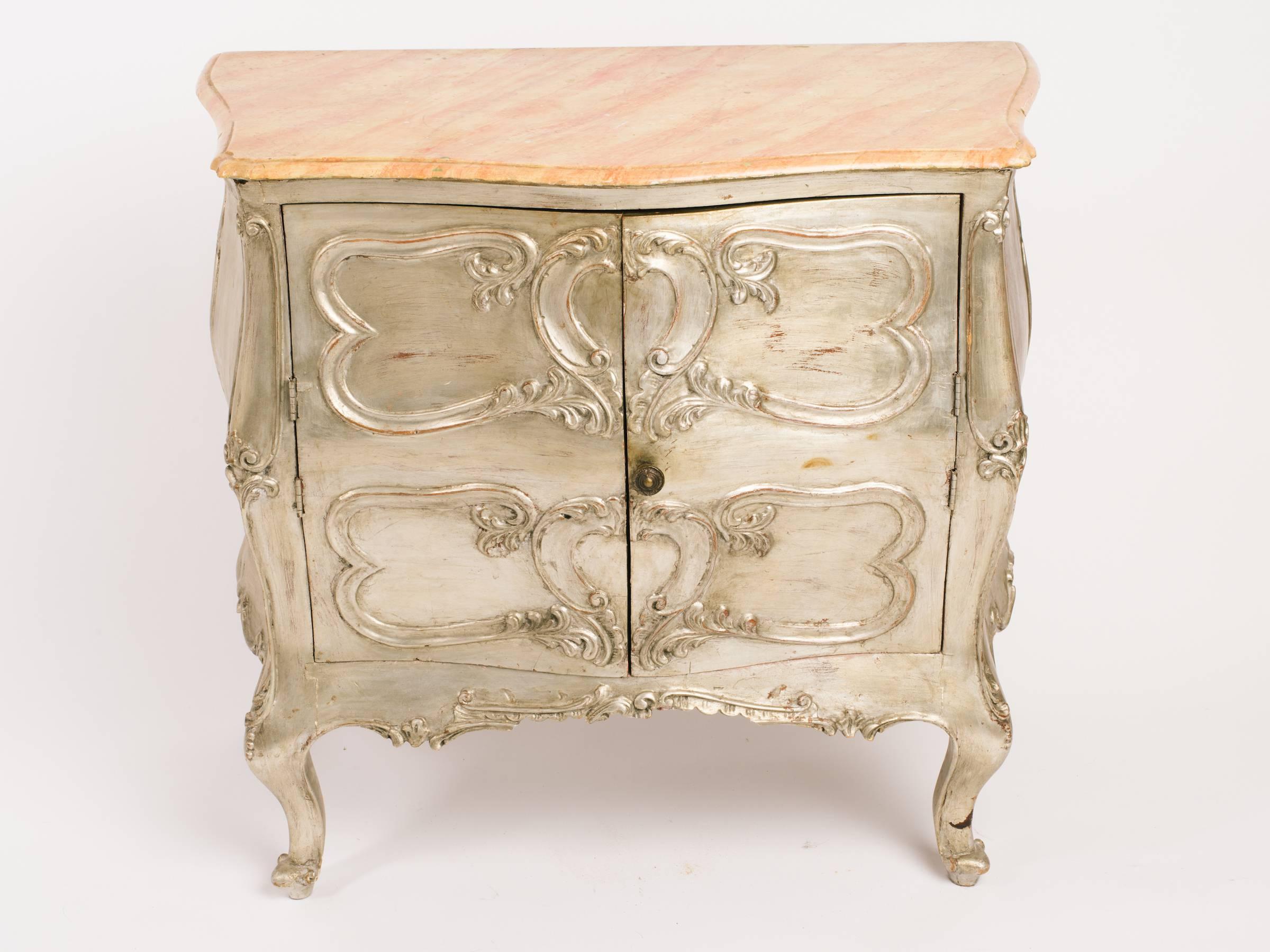 Pair of 1950s Italian silver leaf, hand-carved wood cabinets with faux painted tops. From a East Hampton, NY estate.