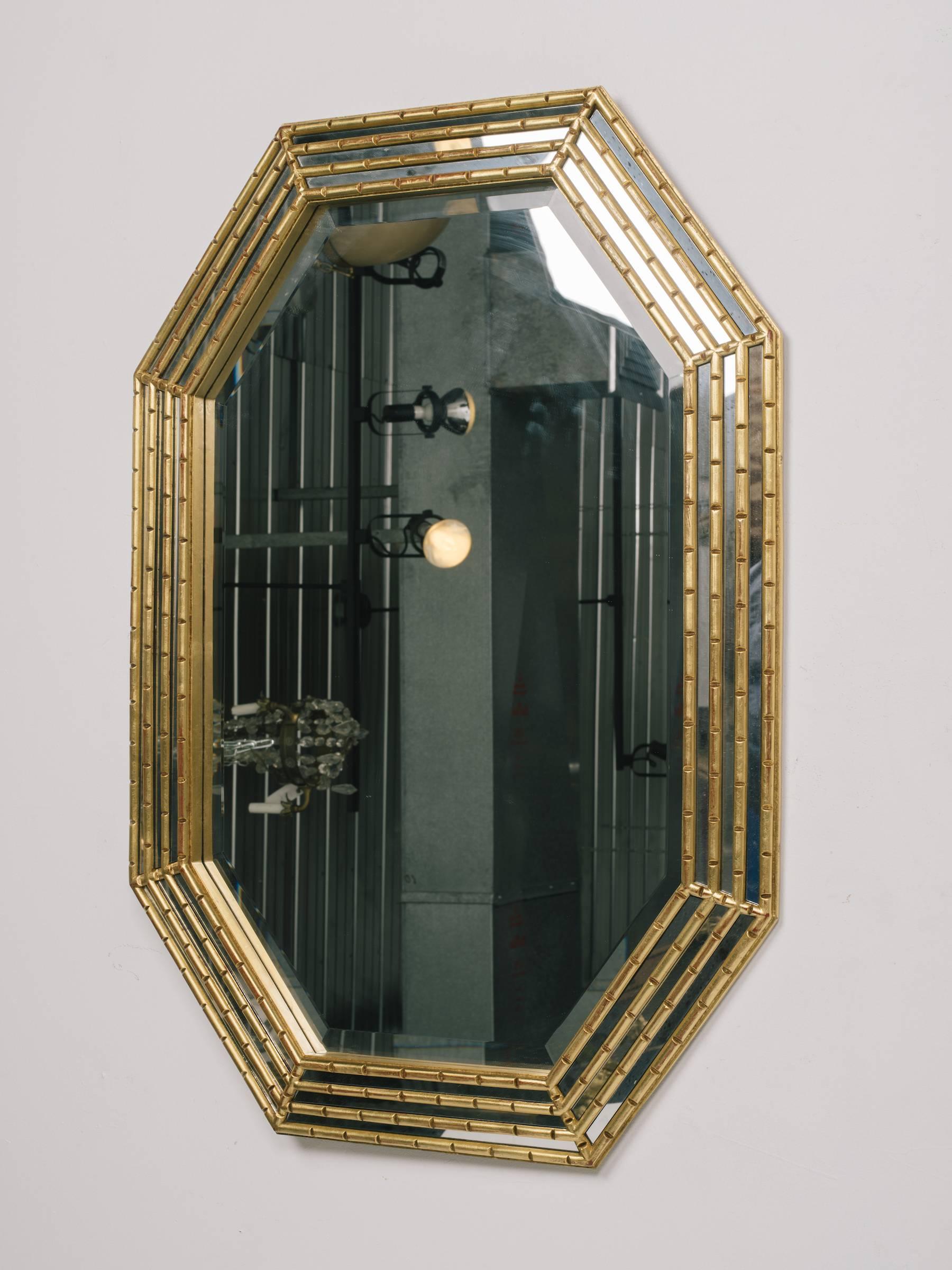 1970s Italian octagonal wood gilt mirror.