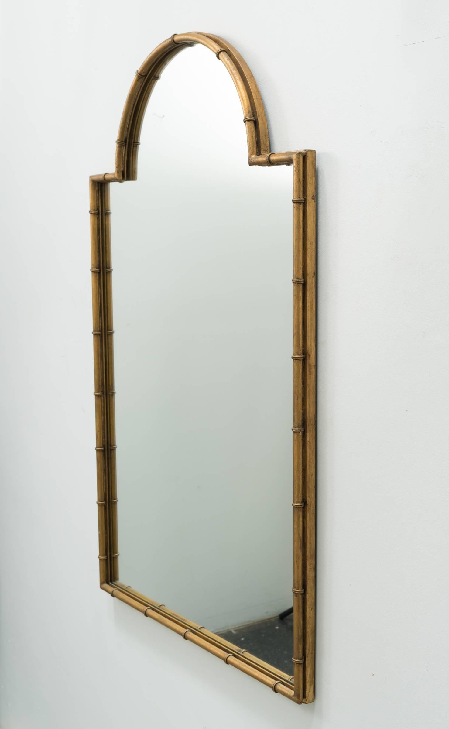 Faux bamboo iron mirror.