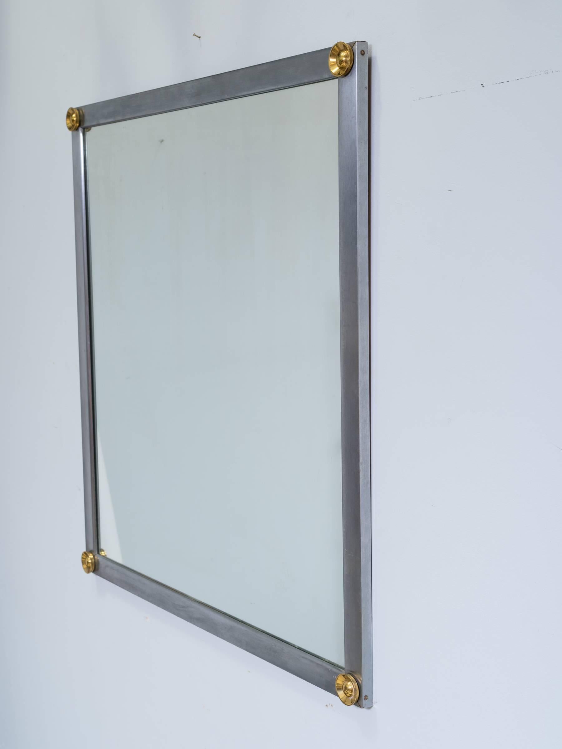Steel with brass accents mirror.