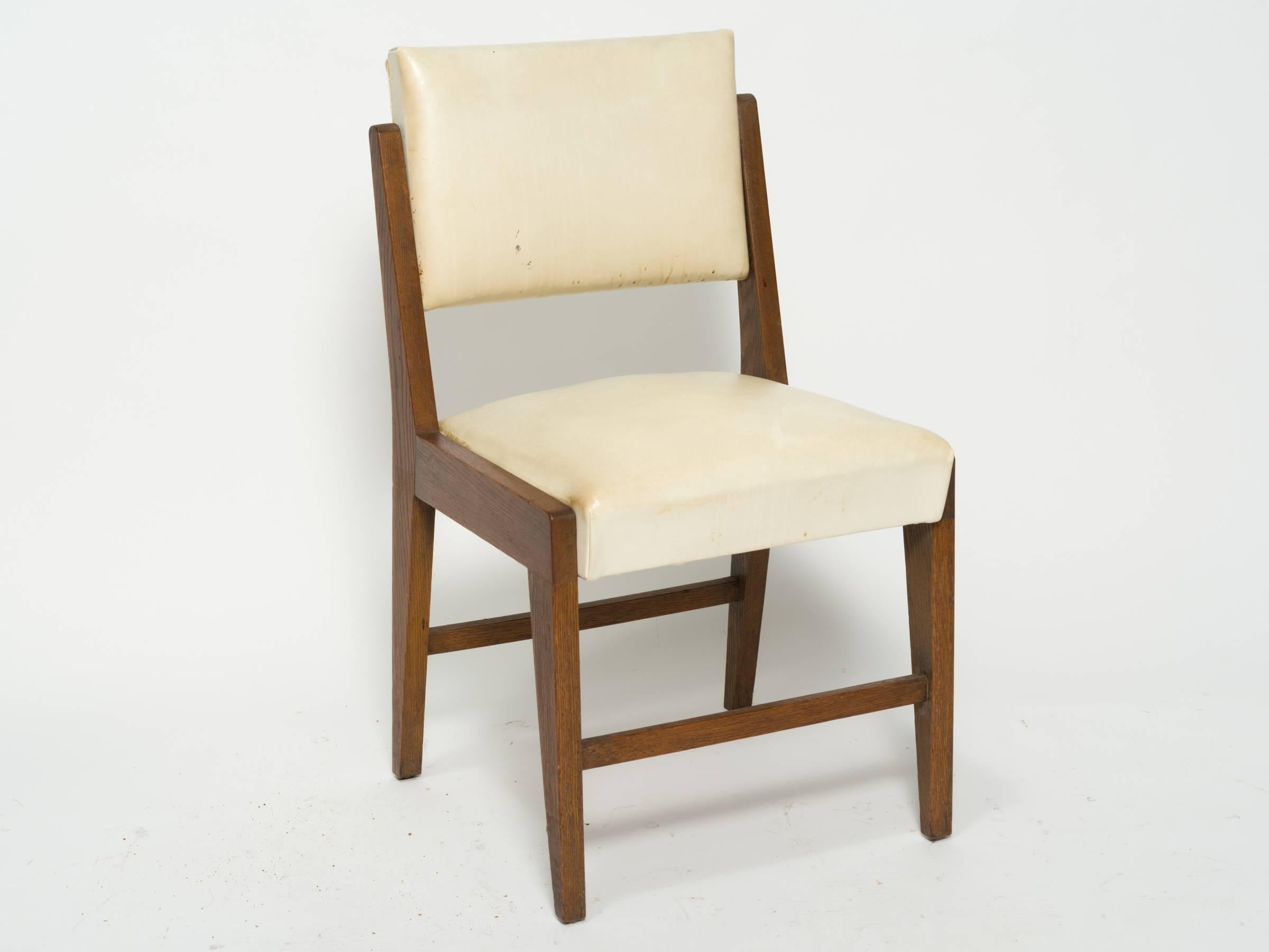 Great lines to these 1950s  ten dining chairs. THere is no table. Your buying 10 Dining chairs.