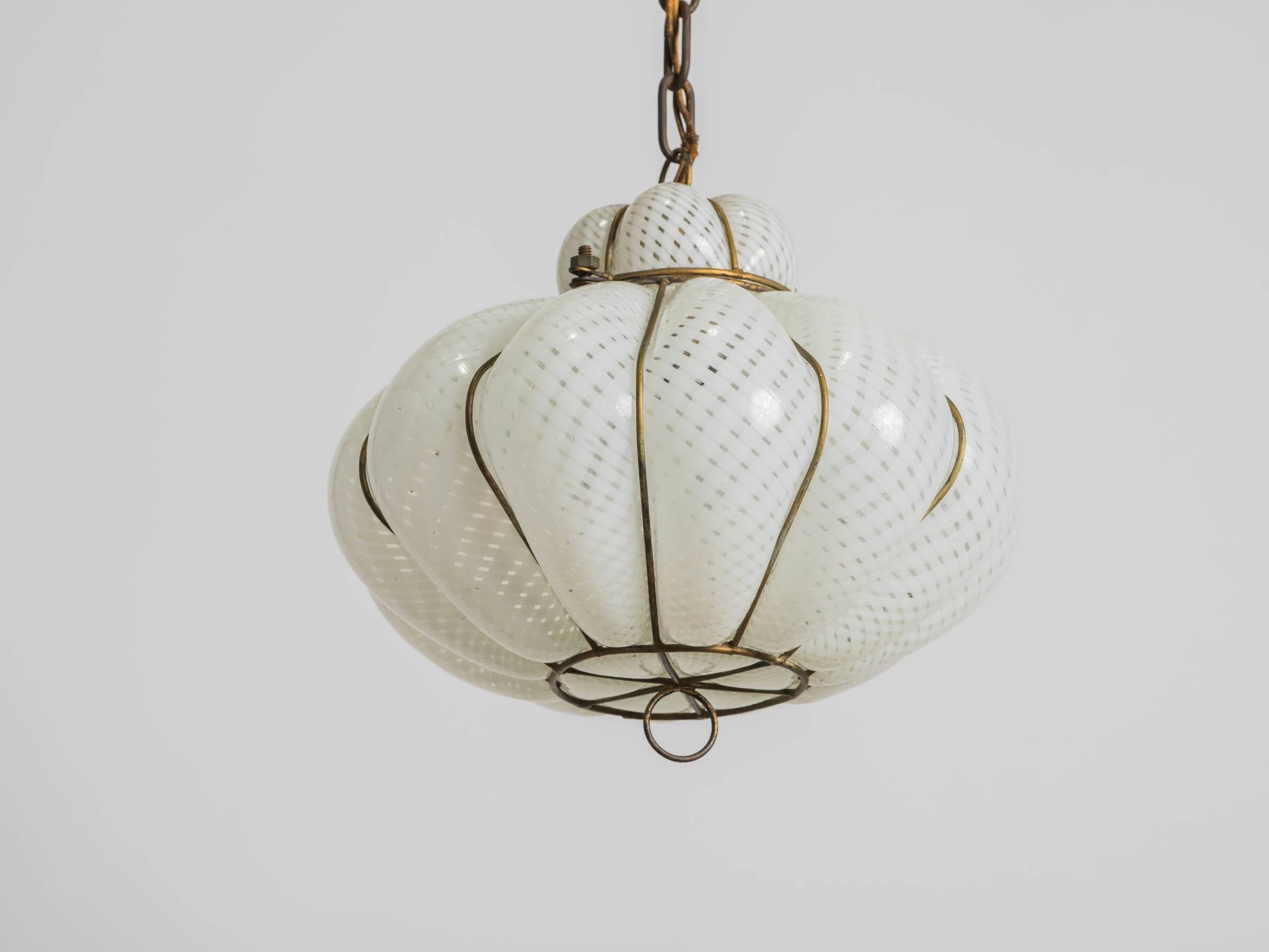 Handblown into a wire cage, this Italian fixture is from the 1950s.