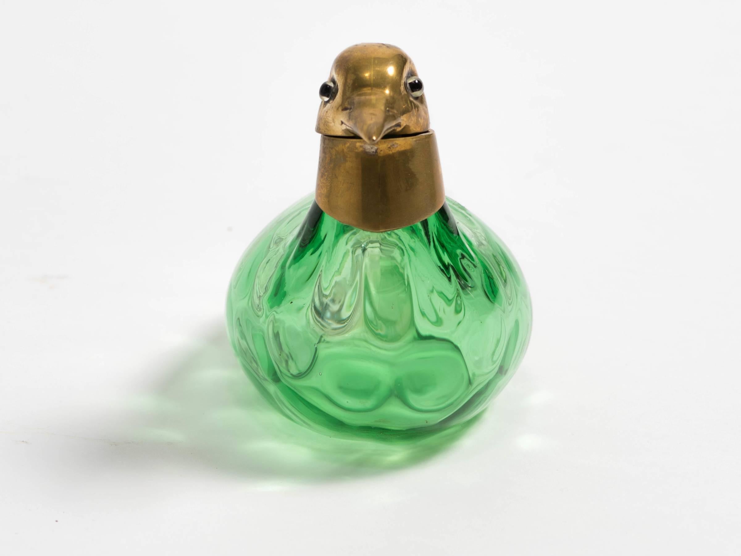 perfume in bottle bird