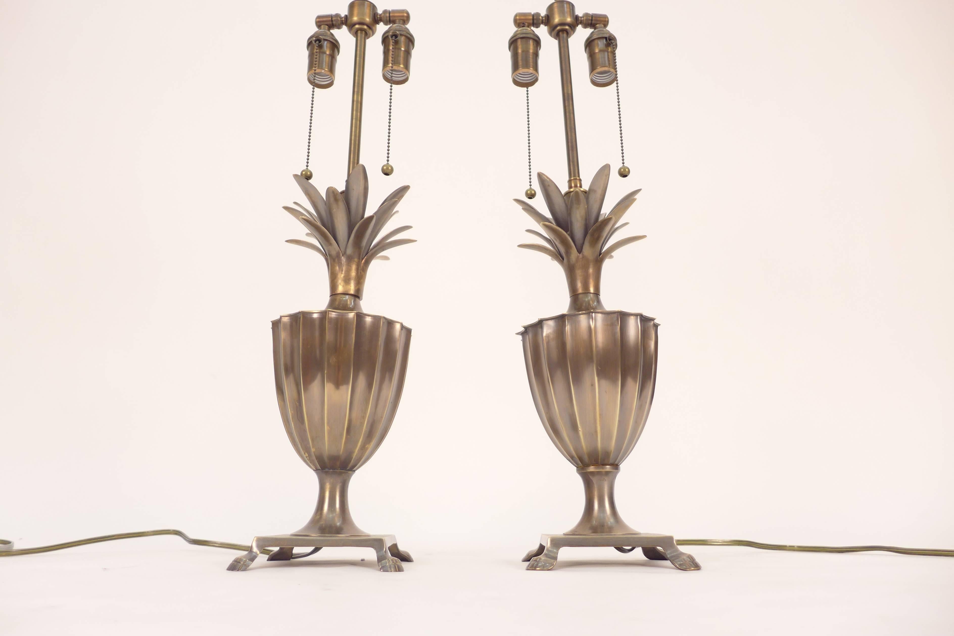 Vintage Hollywood Regency brass pineapple Chapman lamp.
Lamps were rewired with double pull chain sockets.