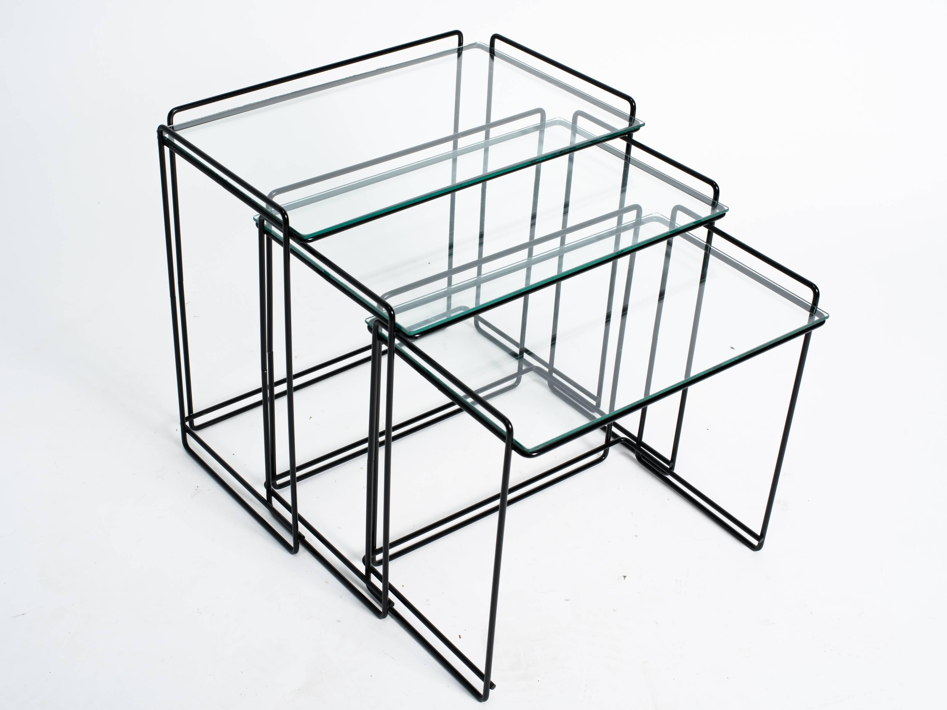 Set of three metal and glass nesting tables by Max Sauze.