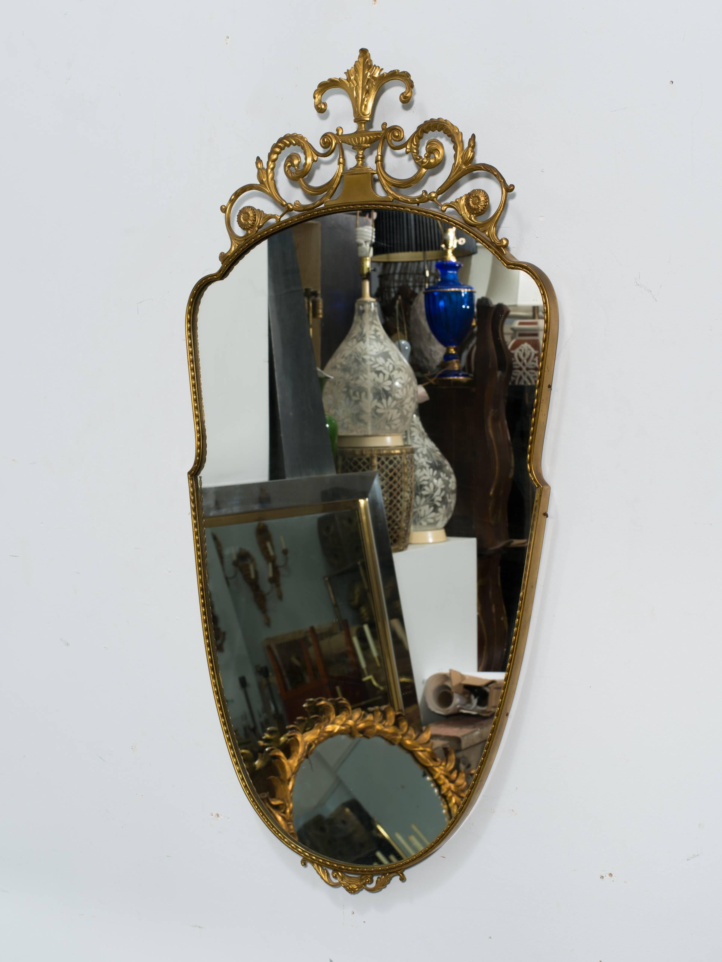 Italian brass wall mirror.