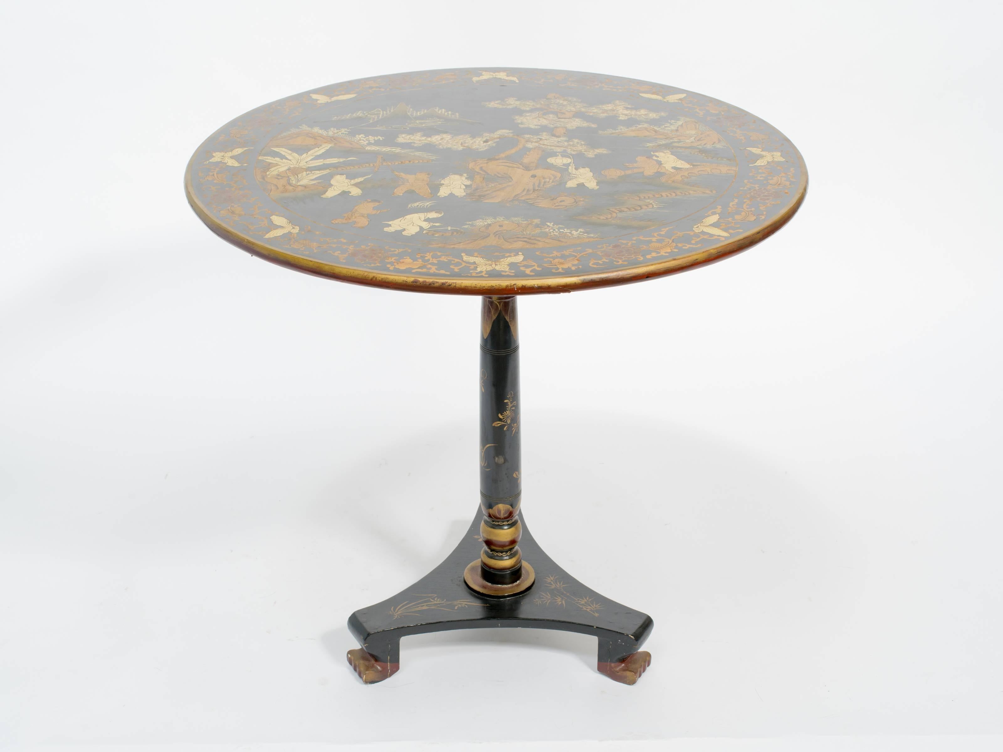 Chinese chinoiserie tilt-top table.