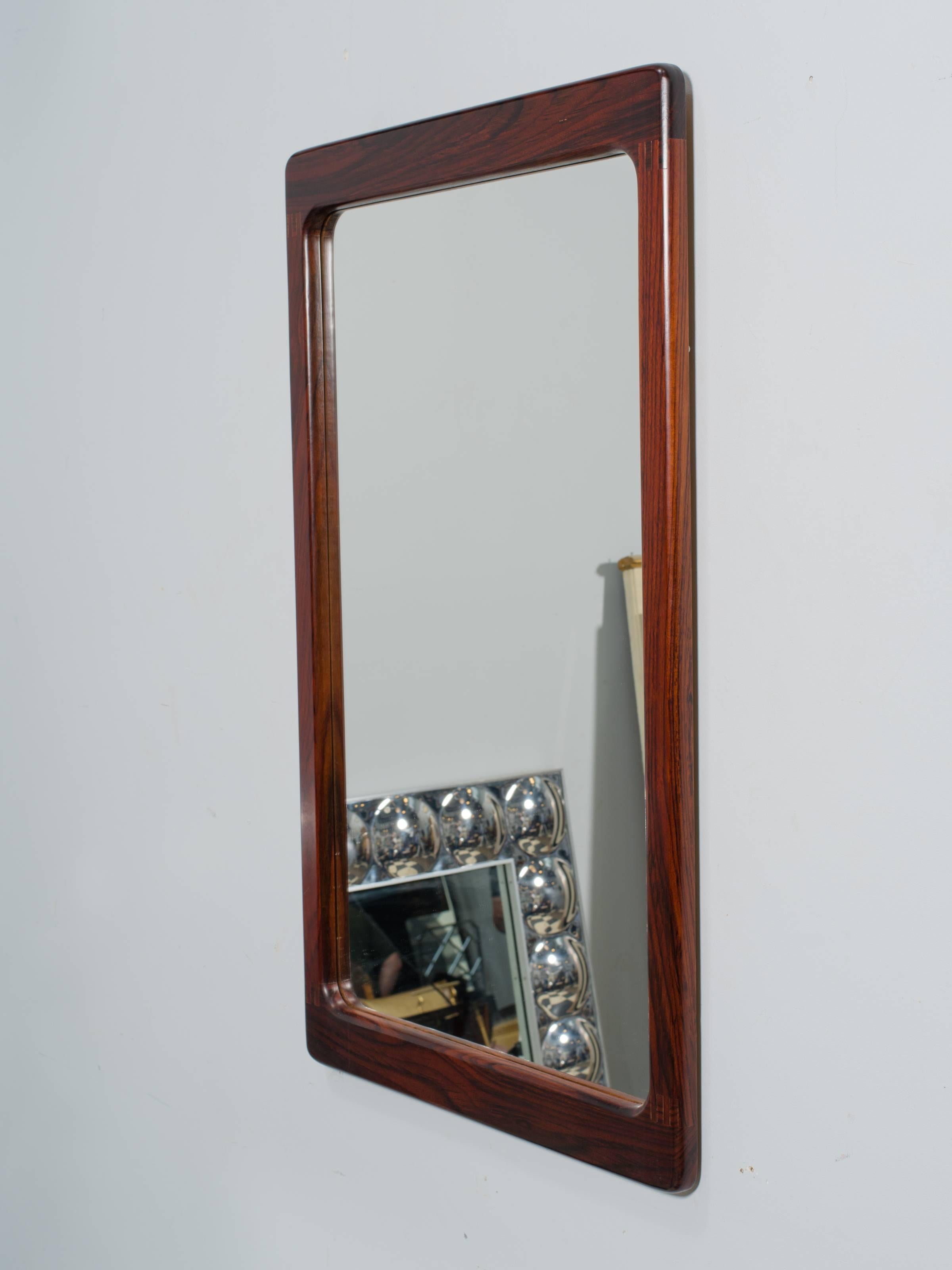 Danish modern rosewood wall mirror.