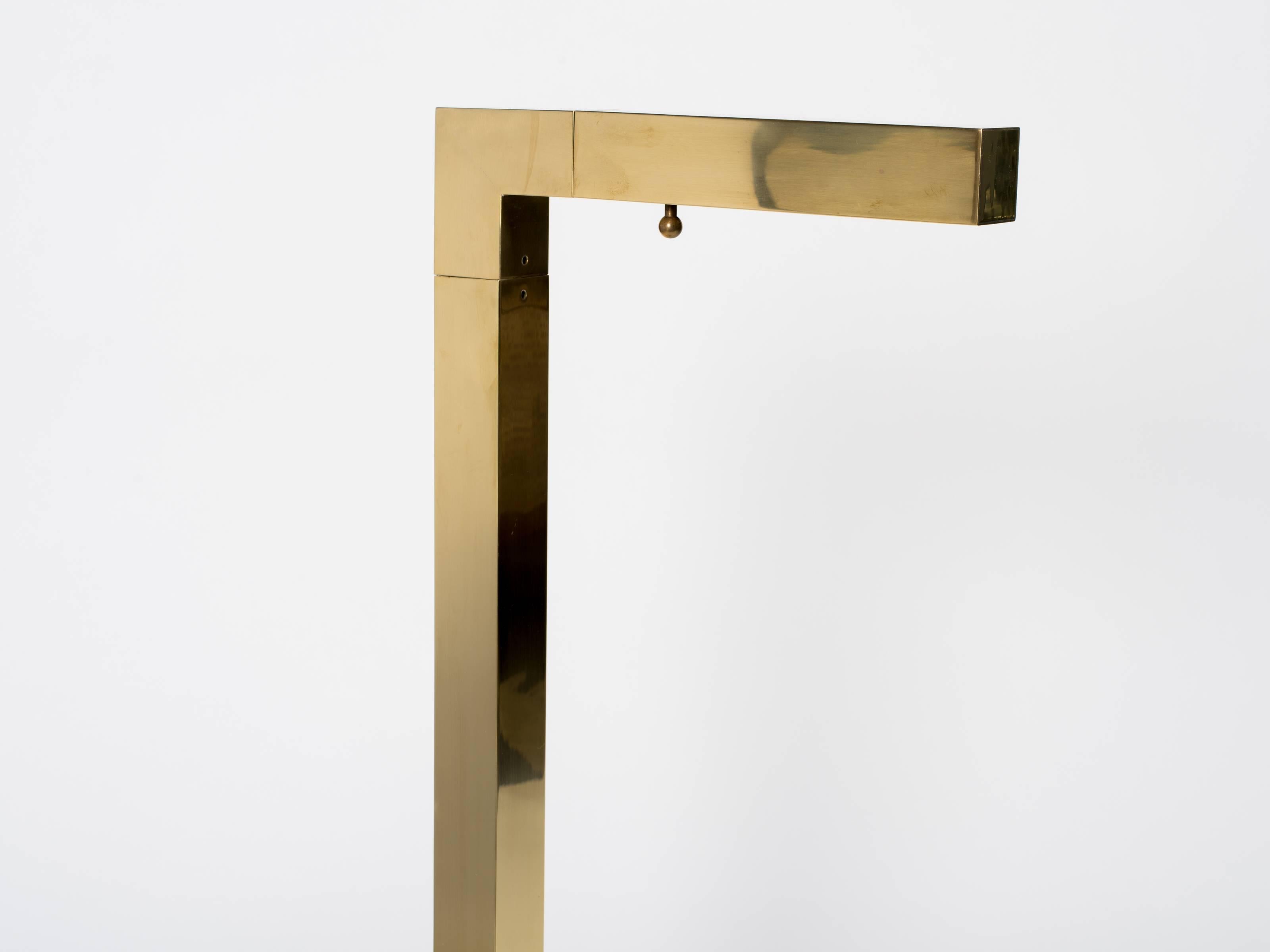 Adjustable brass floor lamp by Chapman.