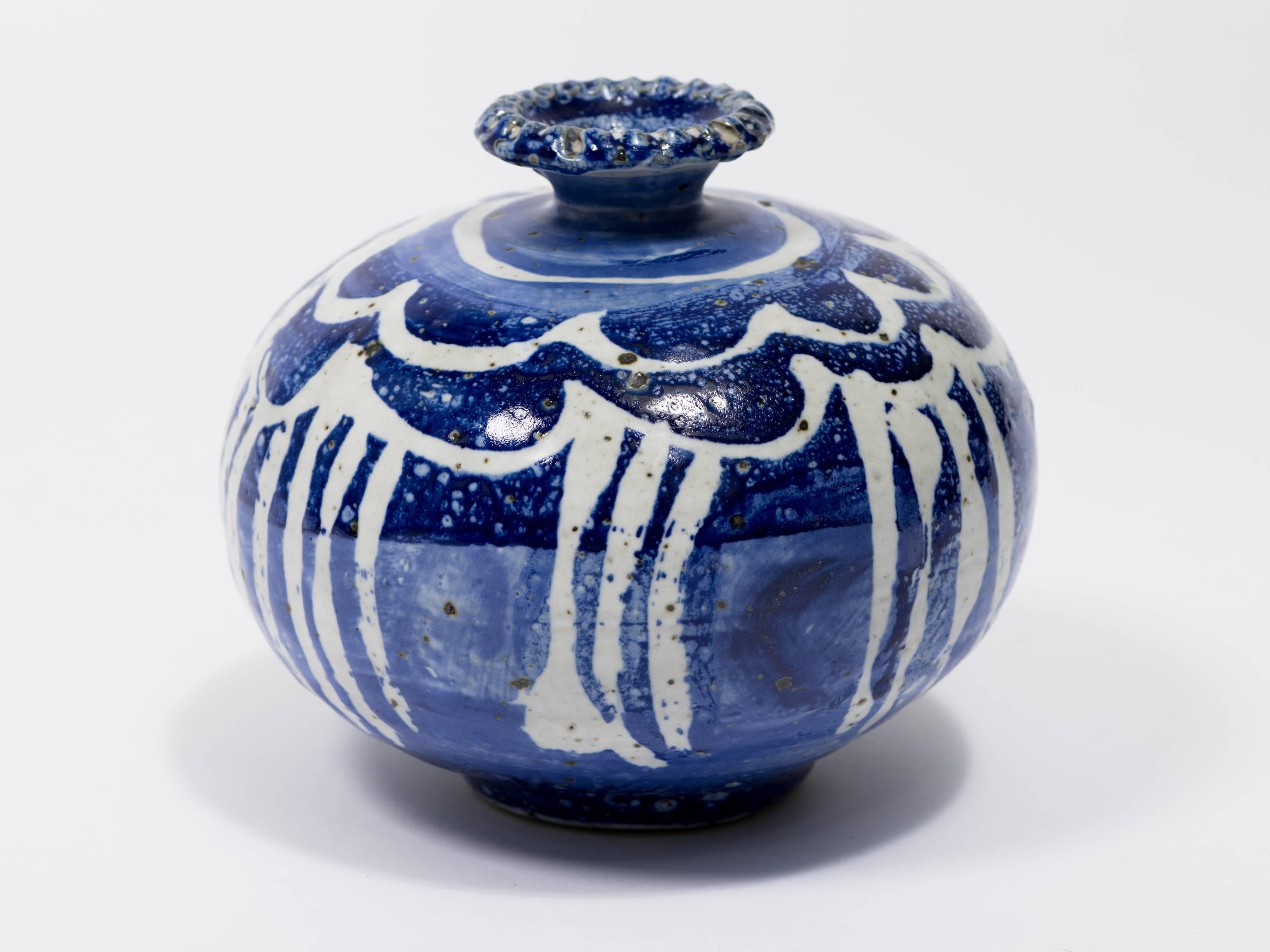 Signed Danish style blue and white pottery vase.
