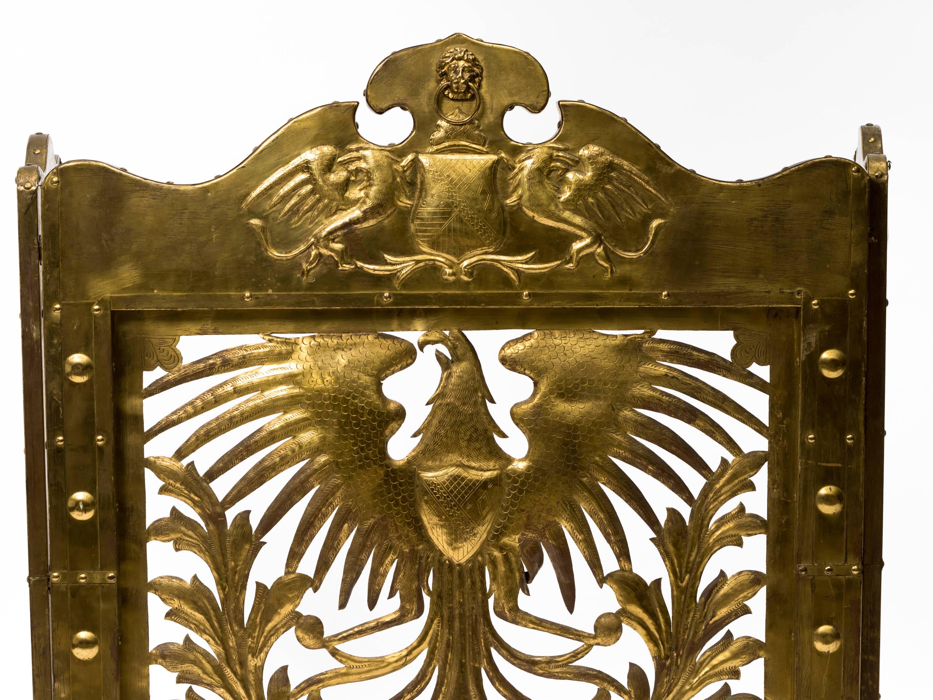 European brass fireplace screen. It is brass over wood.