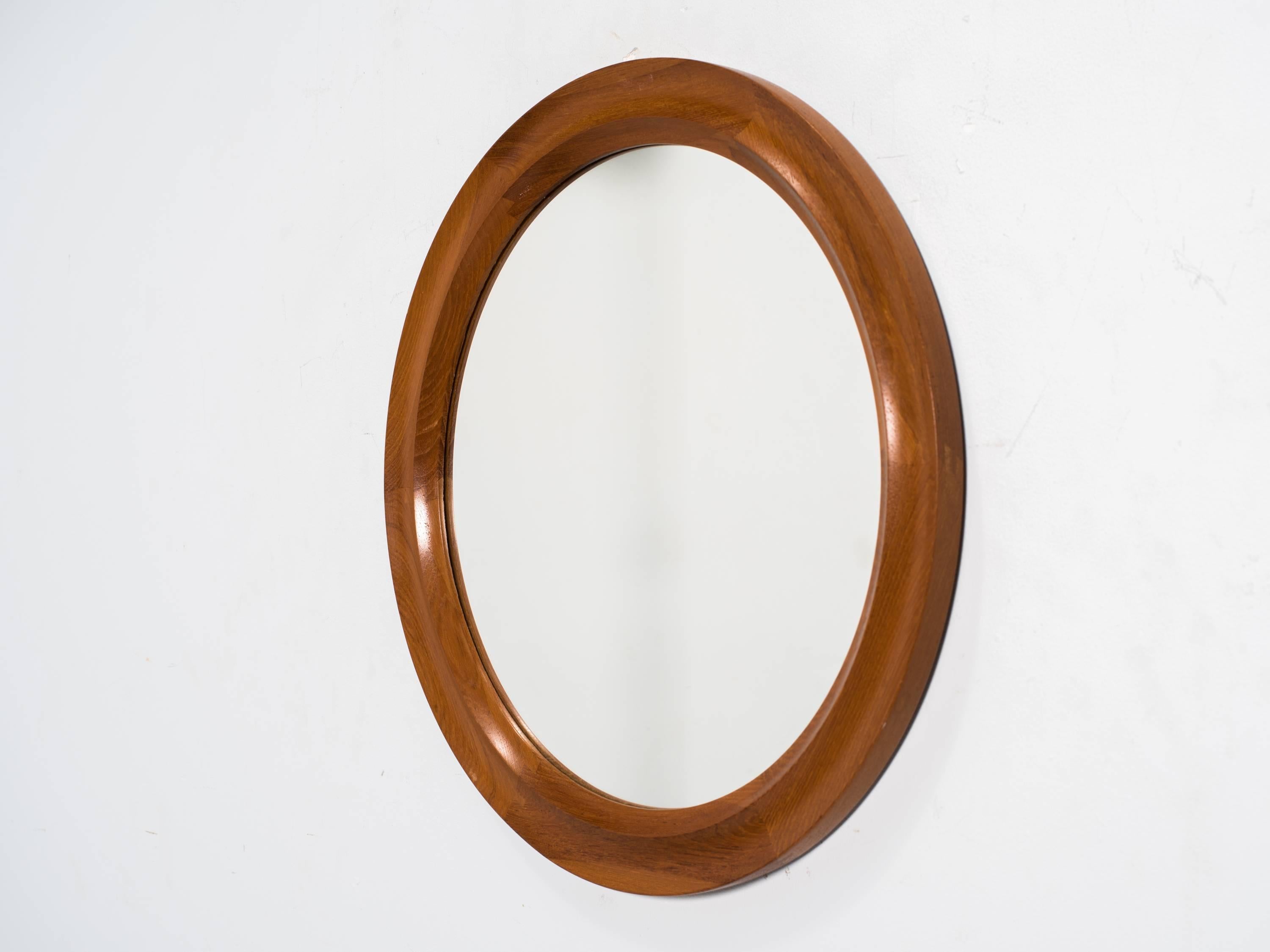 Danish modern round teak wall mirror by Pedersen & Hansen.