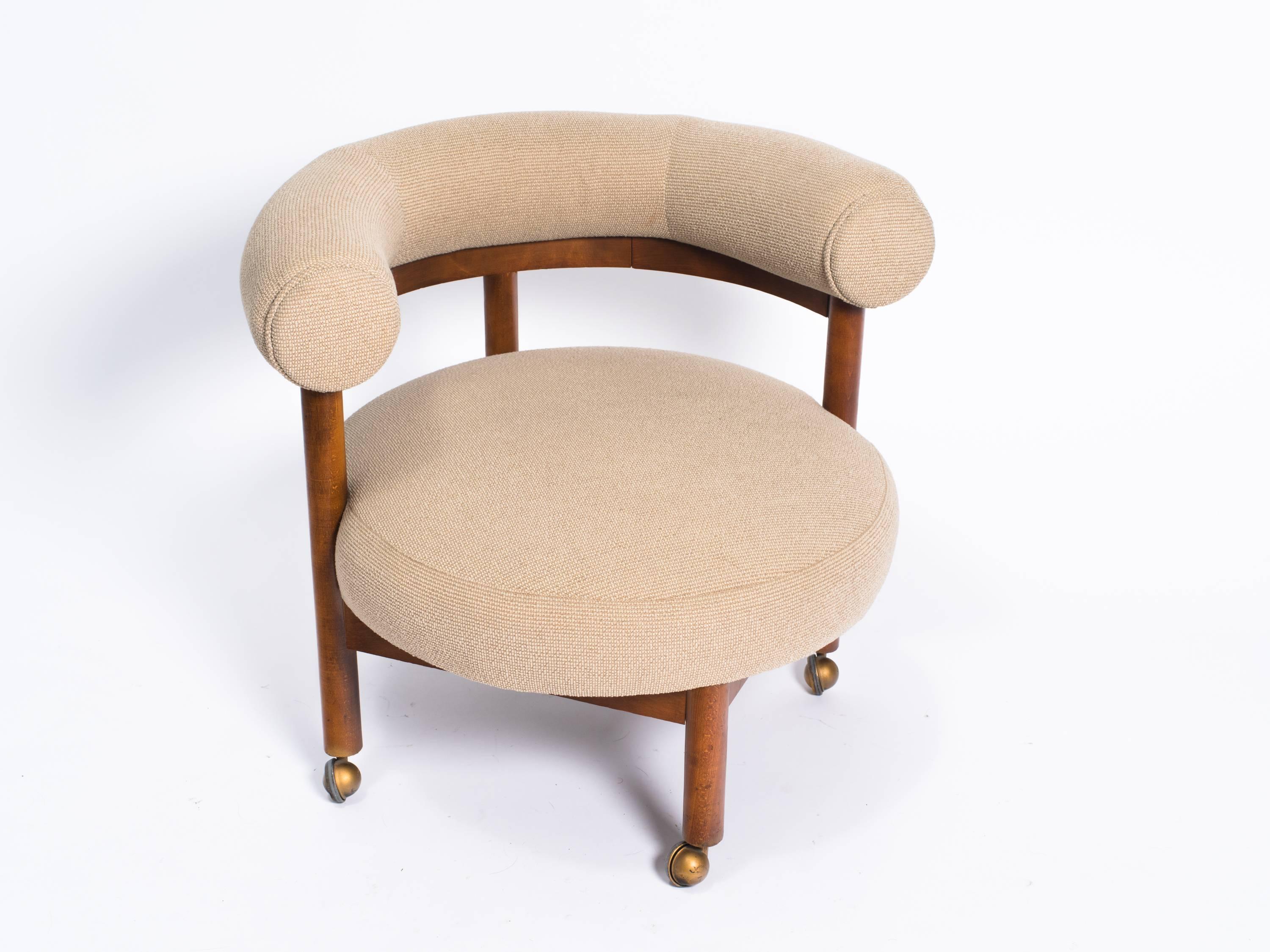 Danish modern occasional chair with casters. Upholstery is good and clean.