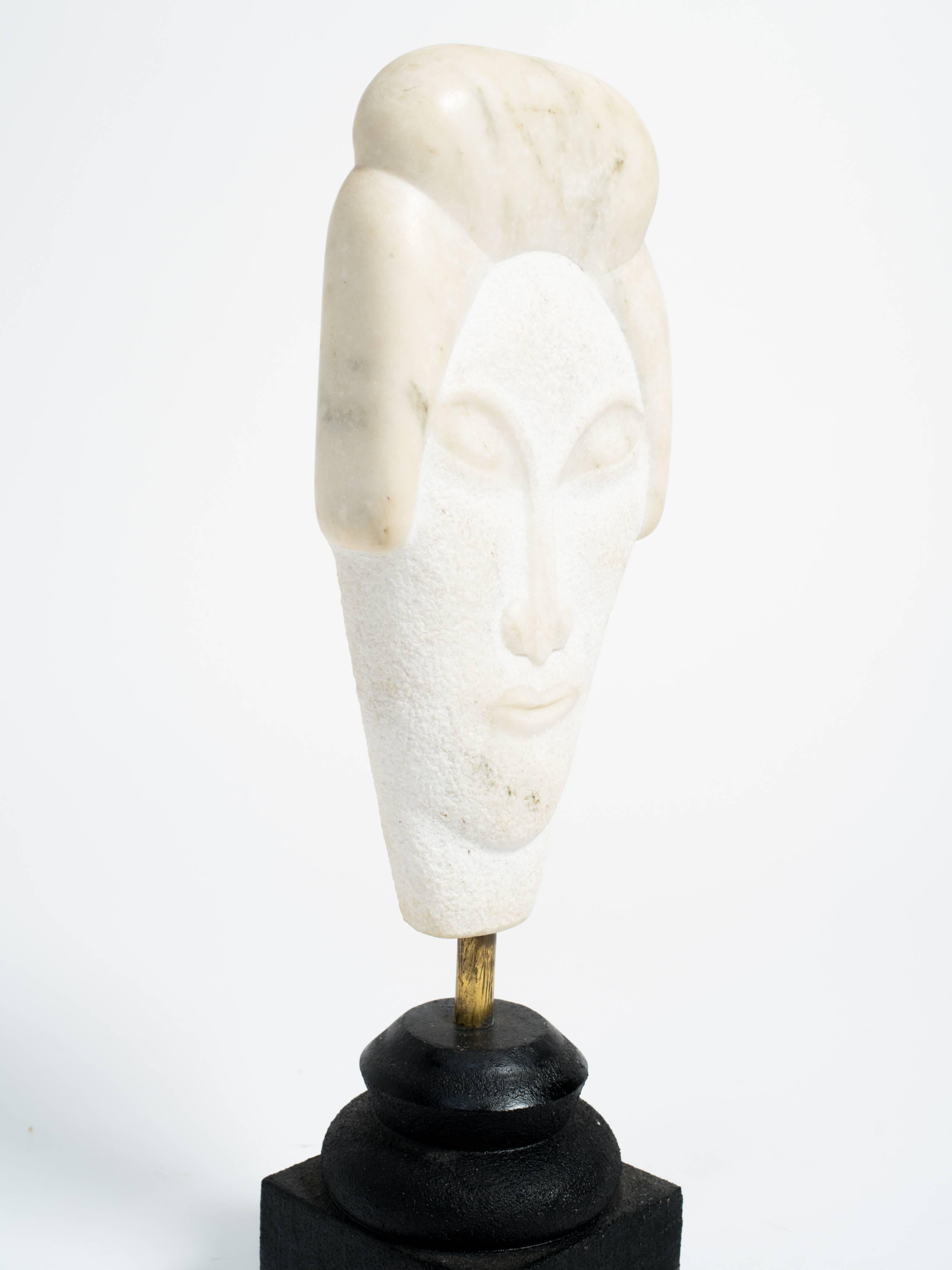 Asian marble bust sculpture on wood base.