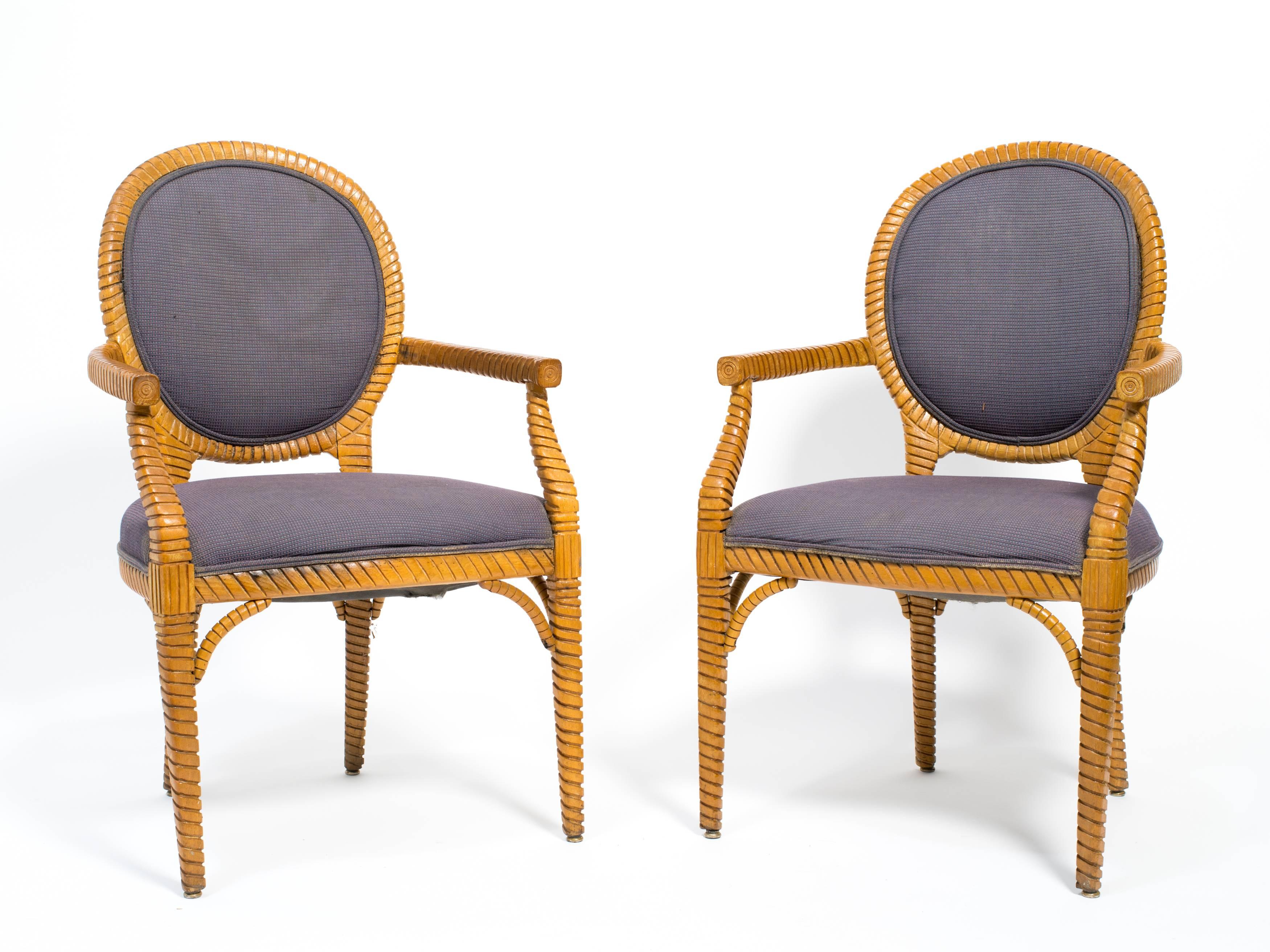 Pair of carved wood armchairs.