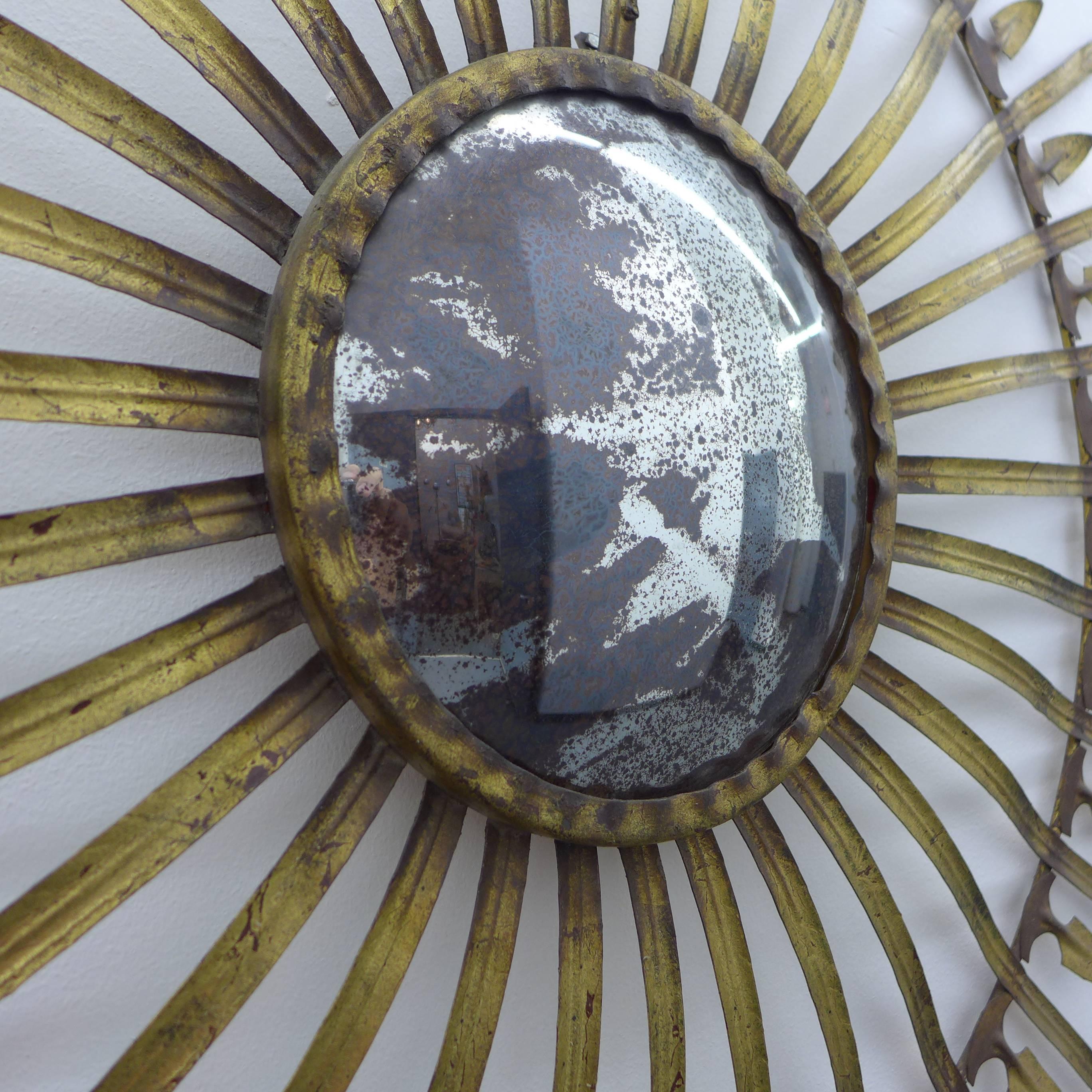 brass starburst mirror