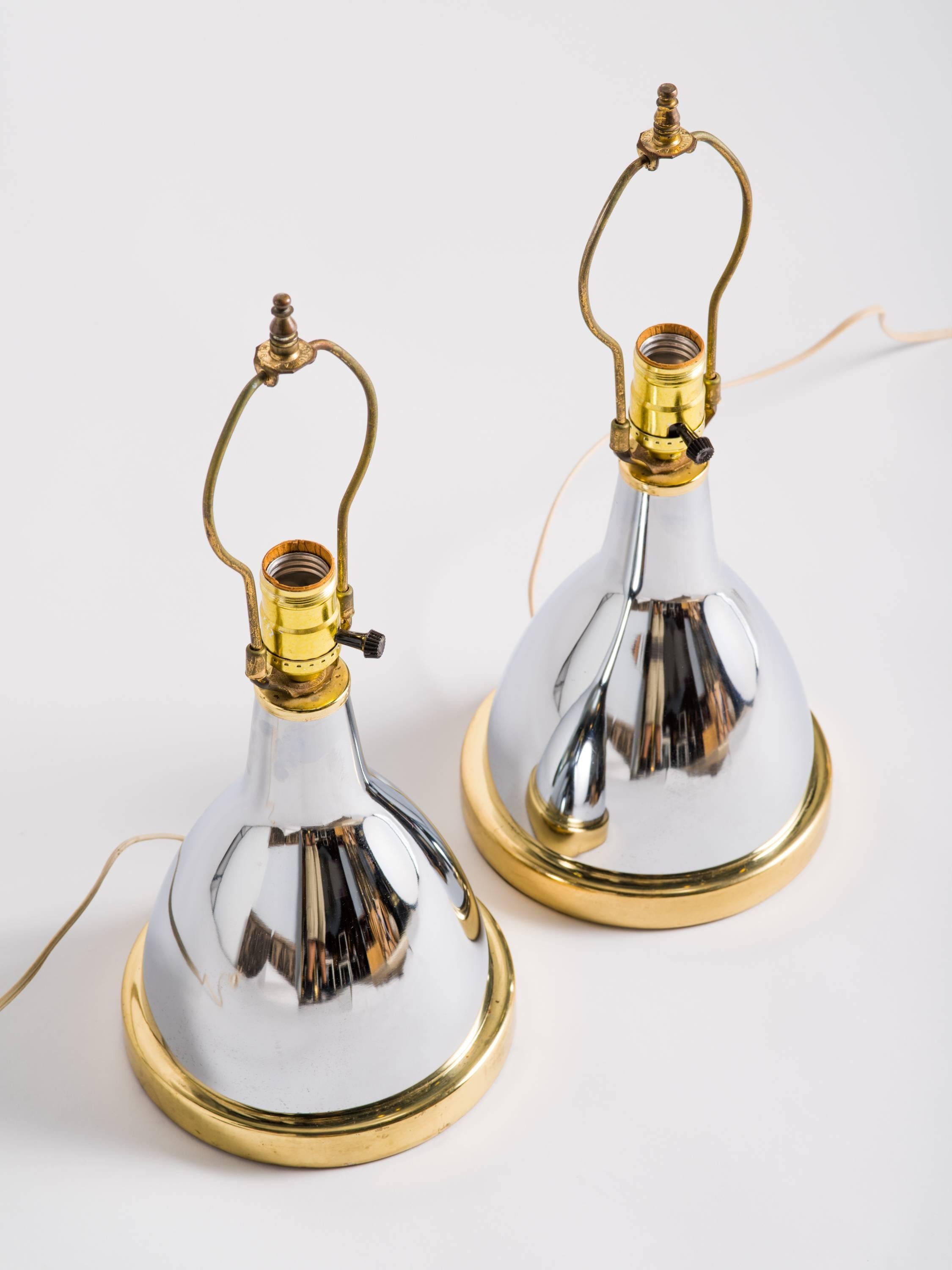 Pair of chrome and brass table lamps.