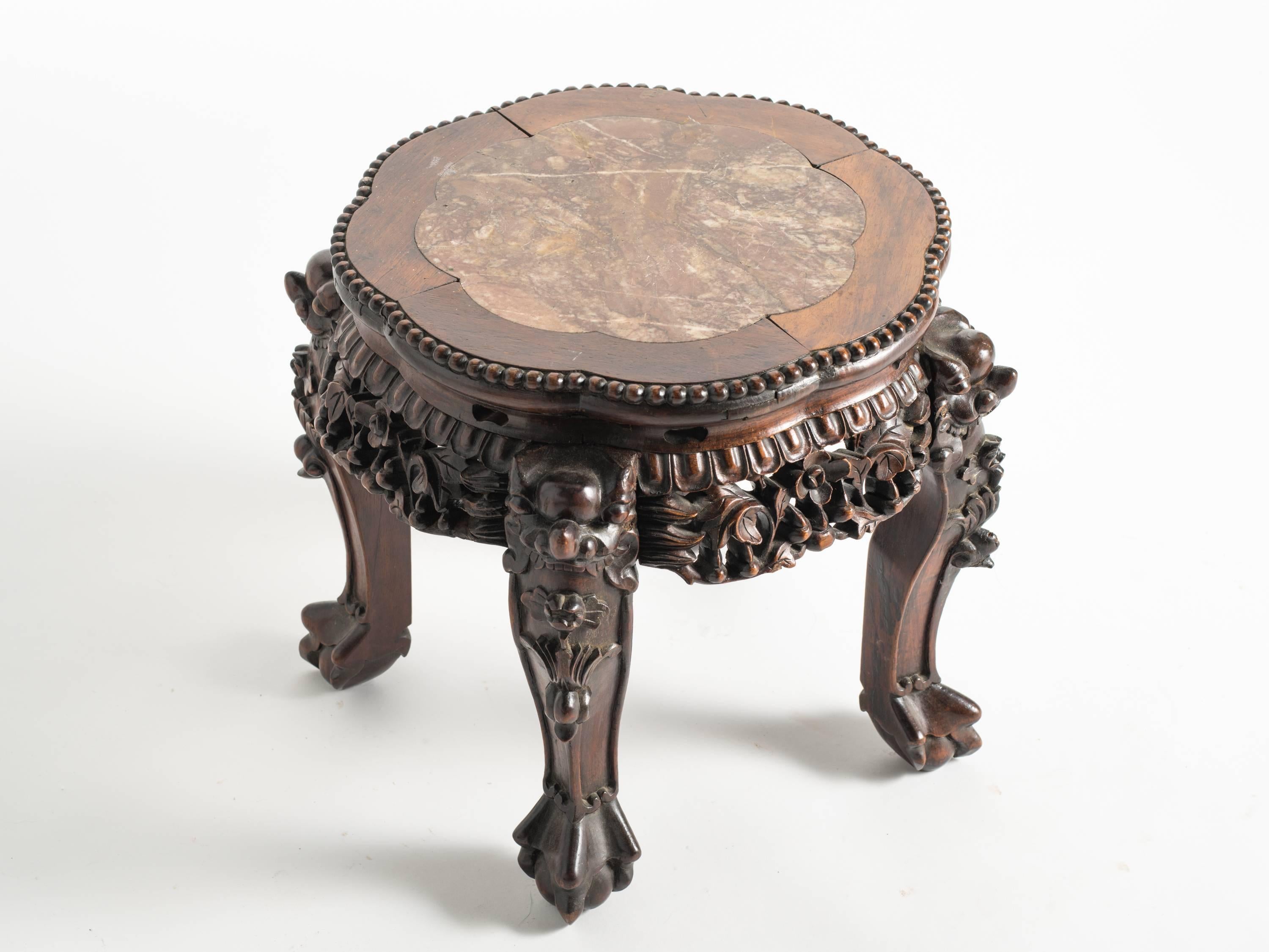 Carved rosewood and marble Chinese side table.