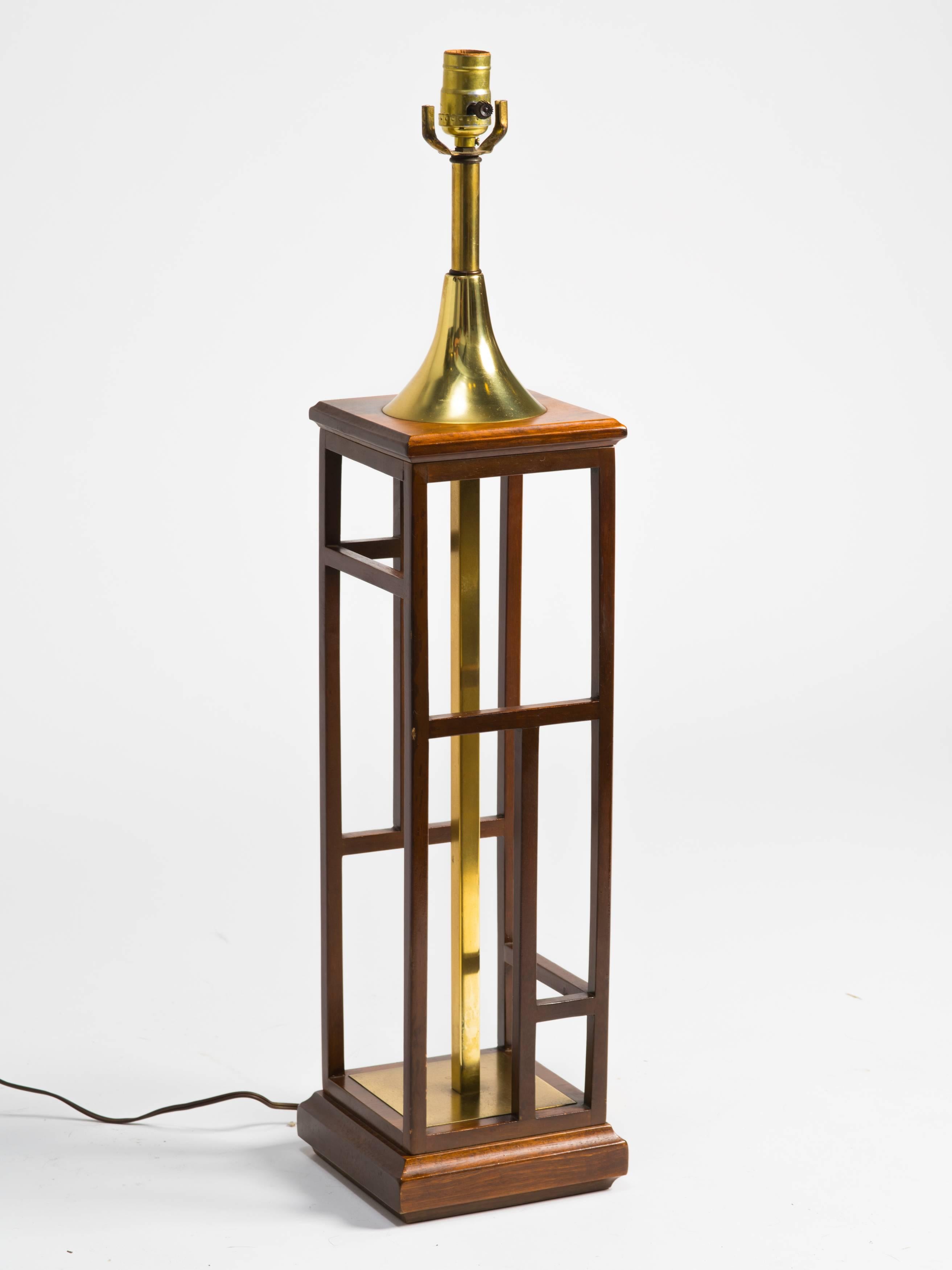 Asian style wood and brass table lamp.