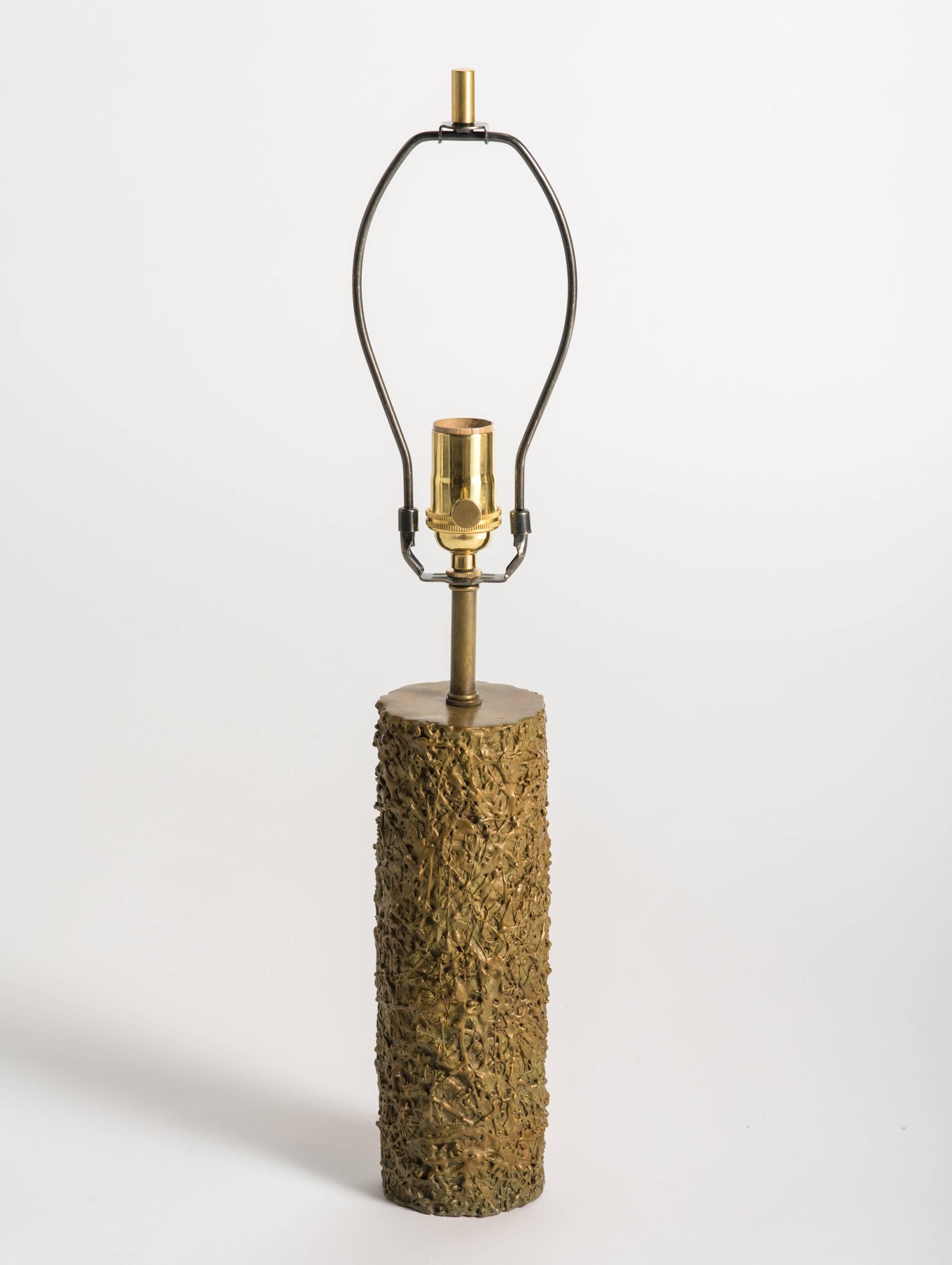 Pair of French textured bronze lamps.
 