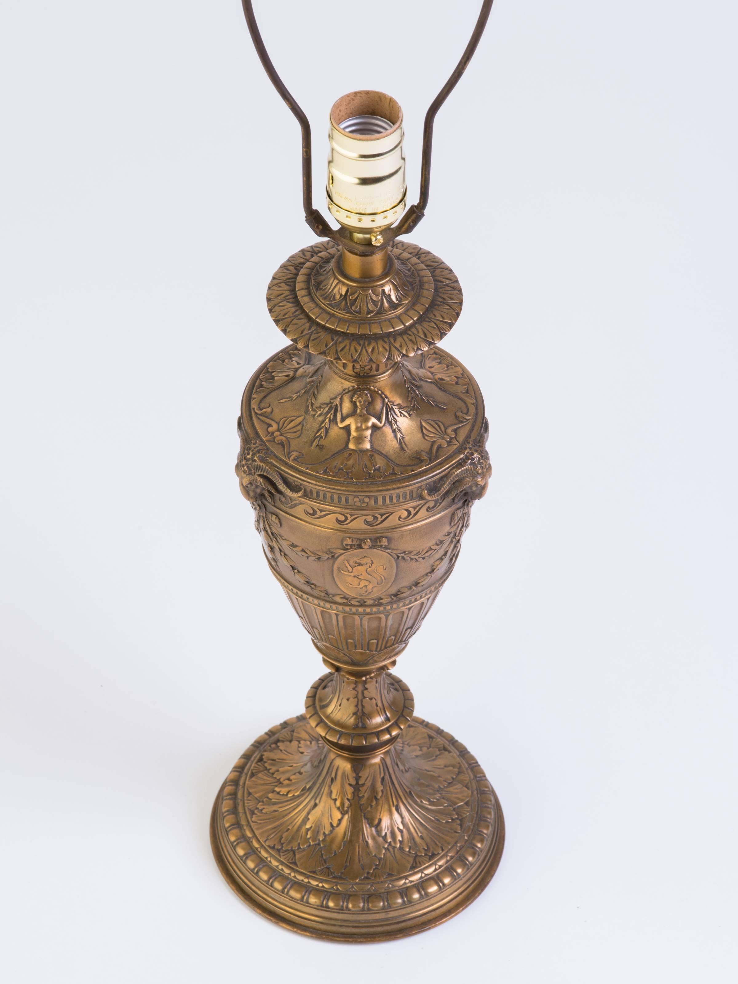 Beautiful 1910s bronze ram's head table lamp.