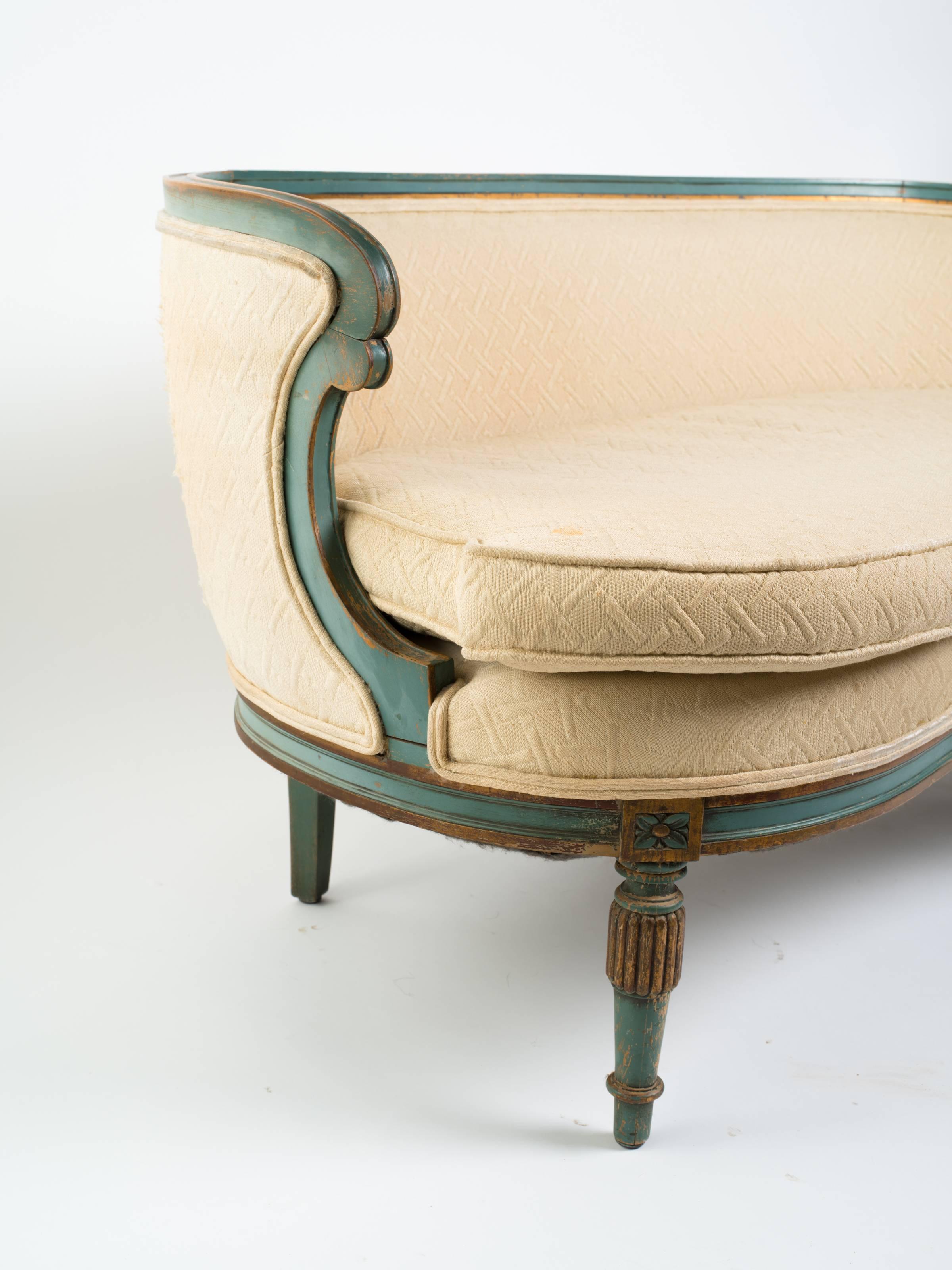 Turn of the century French Regency style curved settee. Painted blue/green with gold.