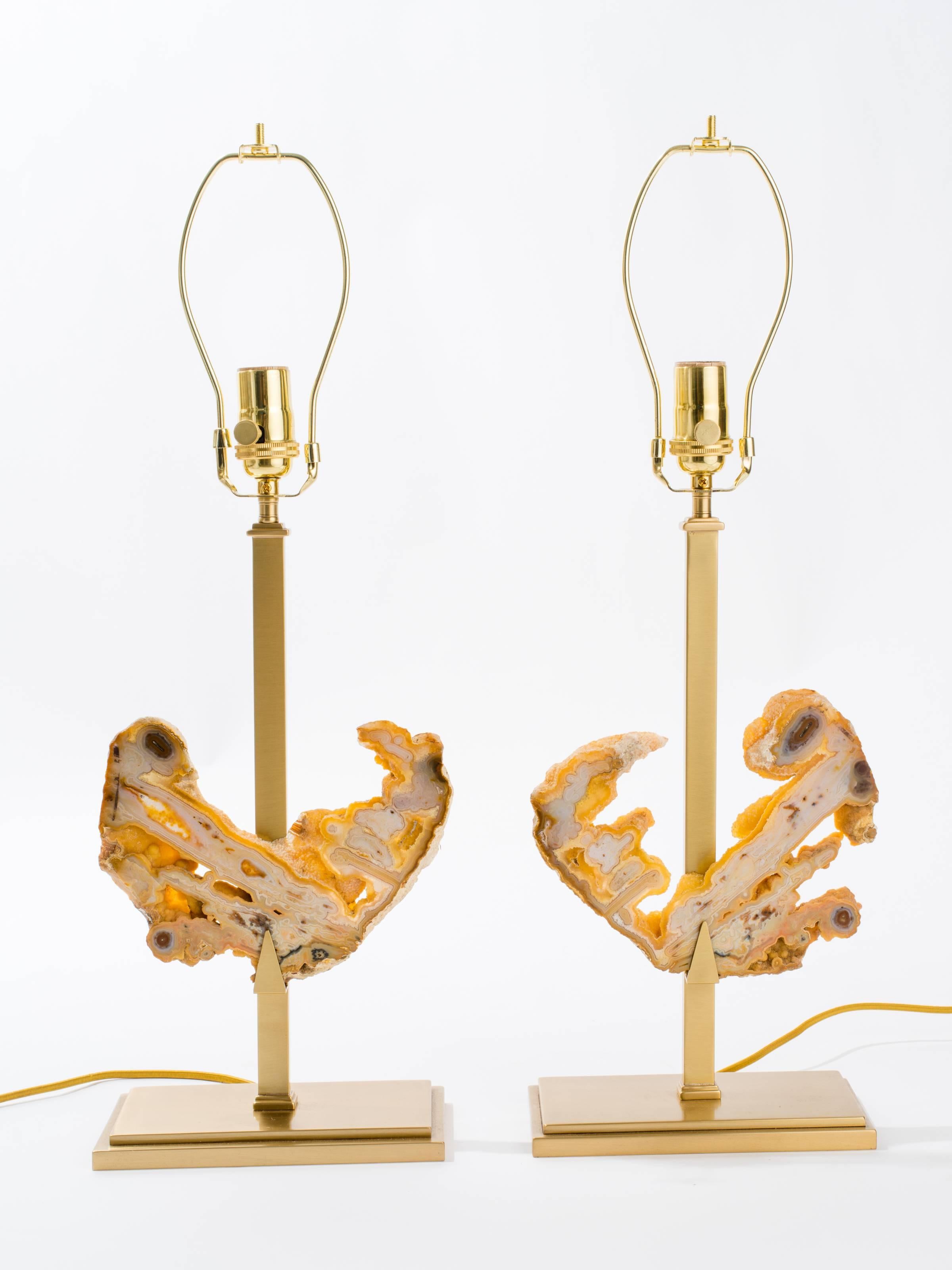 This is a unique pair of Agate table lamps.
Gemstones were hand picked among many specimens.
Custom-made by the artist these solid brass bases were designed specifically to display these beautiful stones.
Agate is one of the oldest jewelry and